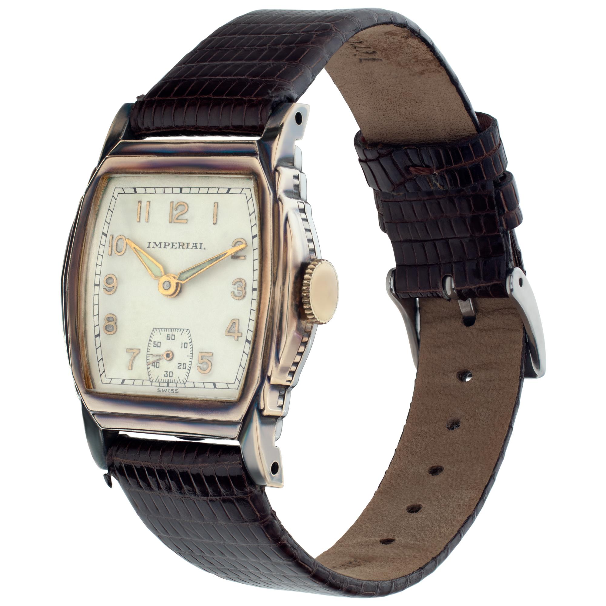 Unisex Imperial gold fill case, gold fill bezel, leather leather band with two piece clasp. Manual wind 7 jewel movement wit sub-seconds. Certified pre-owned. Circa 1940 Fine Pre-owned Imperial Watch. Certified preowned Vintage Imperial Classic