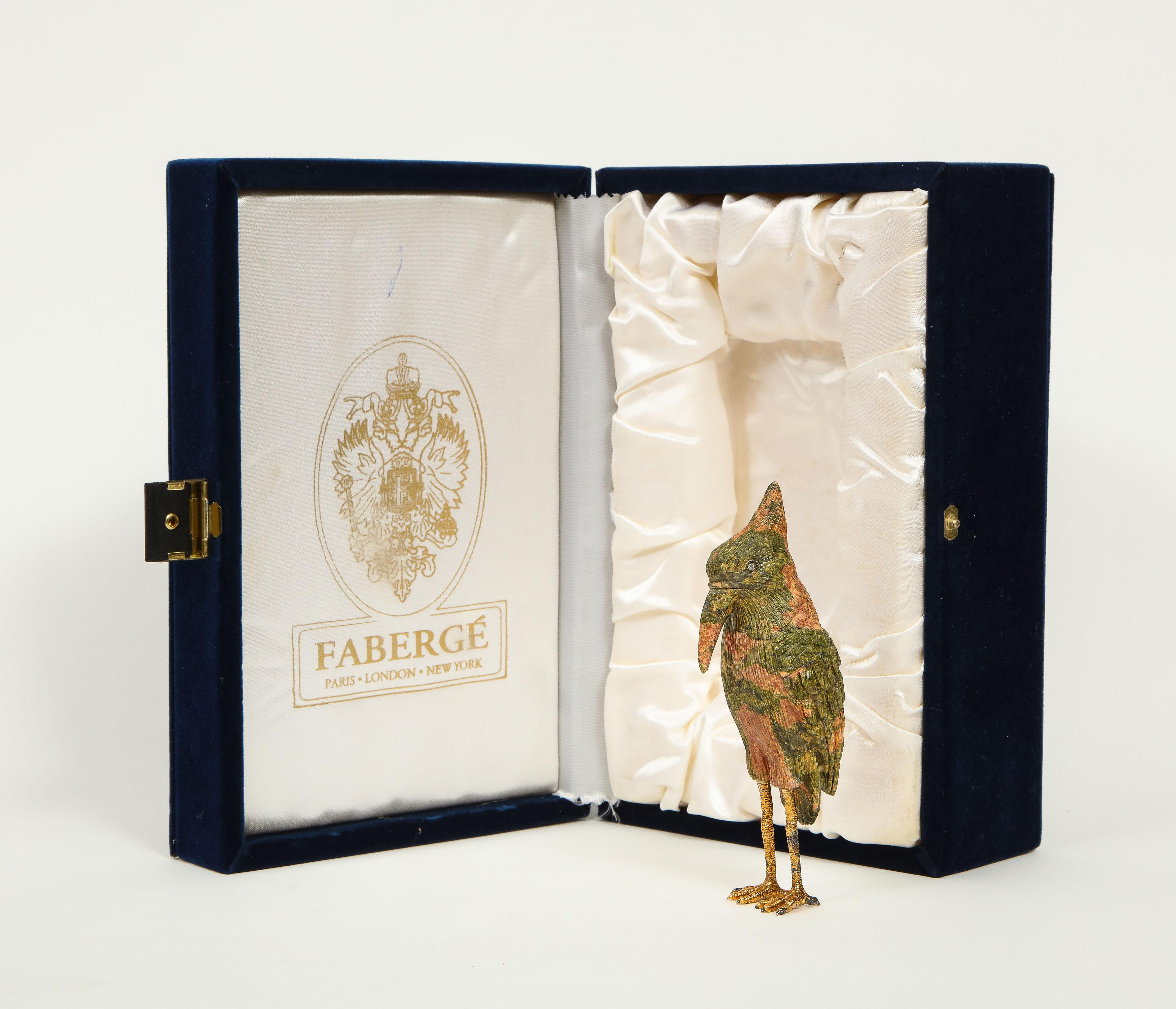 Imperial Faberge carved Unakite and 925 silver with diamonds woodpecker, 20th century.

The unakite legs are gold plated 925 silver and the eyes are diamonds. 

In original box. Limited Edition.

Measures: 5