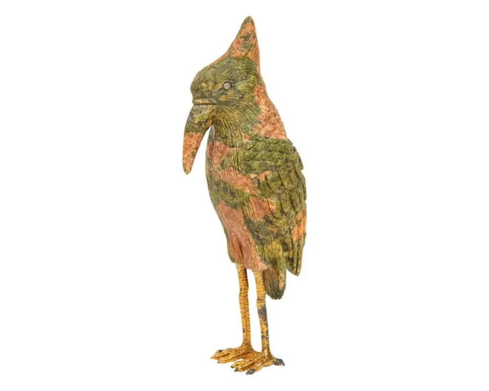 Imperial Faberge carved Unakite and 925 silver with diamonds woodpecker, 20th century. 
The unakite legs are gold plated 925 silver and the eyes are diamonds. 
In original box. Limited Edition. 
Measures: 5? high x 2? deep x 2? wide.

 