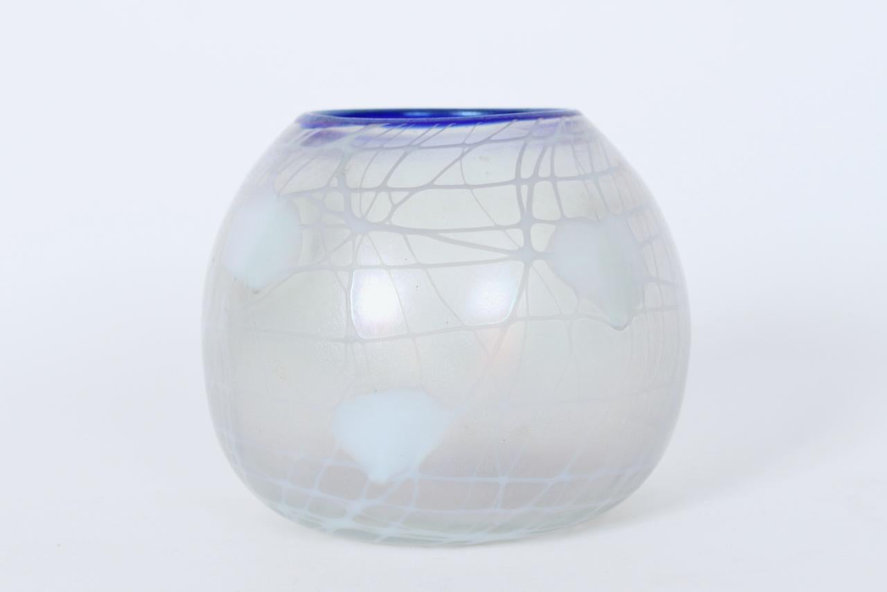 Imperial Glass Company Freehand Hanging Hearts Art Glass Globe Vase. Rose Bowl Vase. Fish Bowl. Ball Vase. Featuring a hand blown translucent frosted art glass ball form with White opaque freehand hanging heart and hand painted web like vine