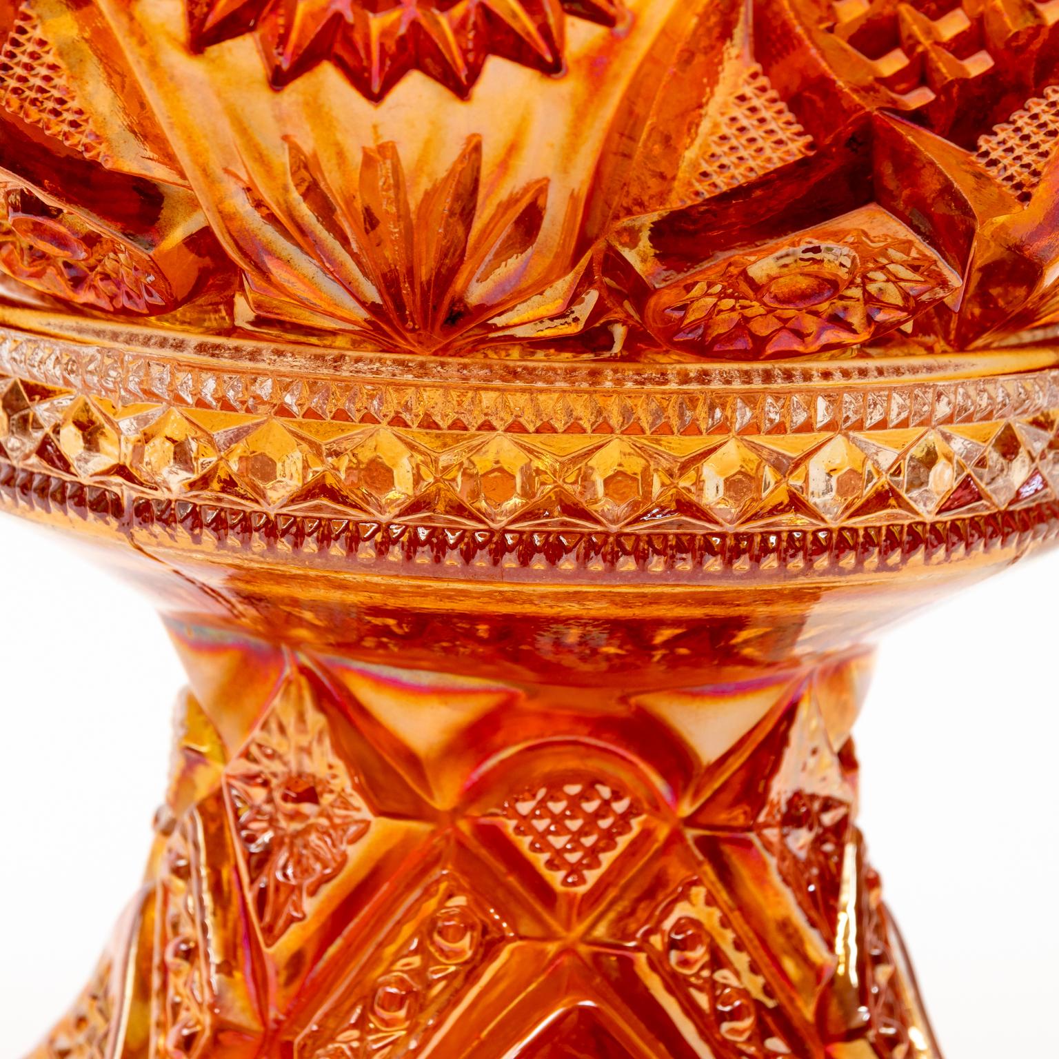 Circa 1960s vintage Imperial glass punch bowl in vibrant marigold color with highly decorated design. Originally made in early 1900s reissued in 1960s. Mint Condition. Never used. Made in the United States. Please note of wear consistent with age.