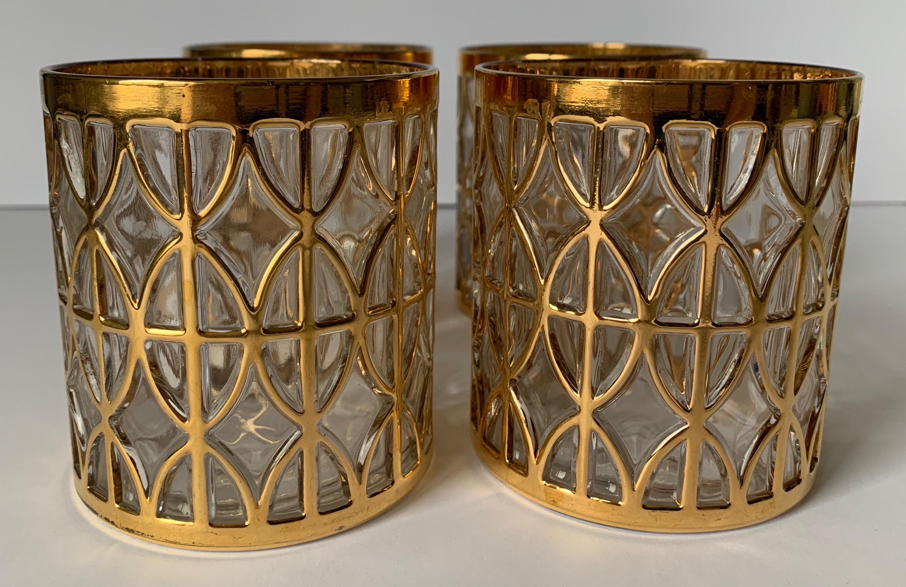 Set of 4 1960s Imperial El Tabique De Oro patterned glasses. Overall raised gold design. Stamped IG on the bottom.