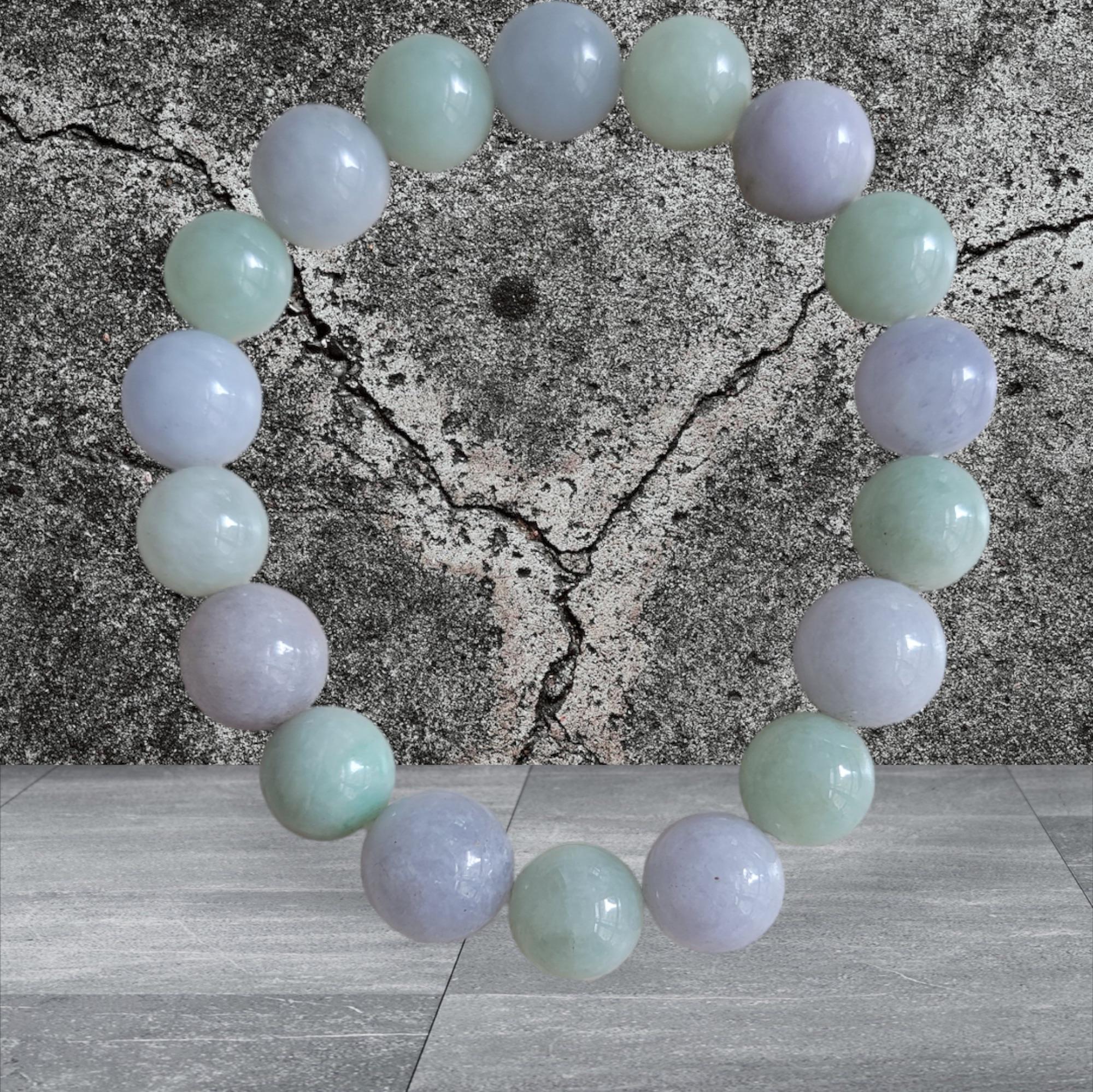Imperial Green and Purple Lavender Burmese A-Jade Jadeite Beaded Bracelet (10-11mm Each x 18 beads) 07002

10-11mm each, 18 perfectly calibrated Green and Lavender Jadeite Beads. Some of the rarest naturally occurring hues of A-Jadeite, Green and