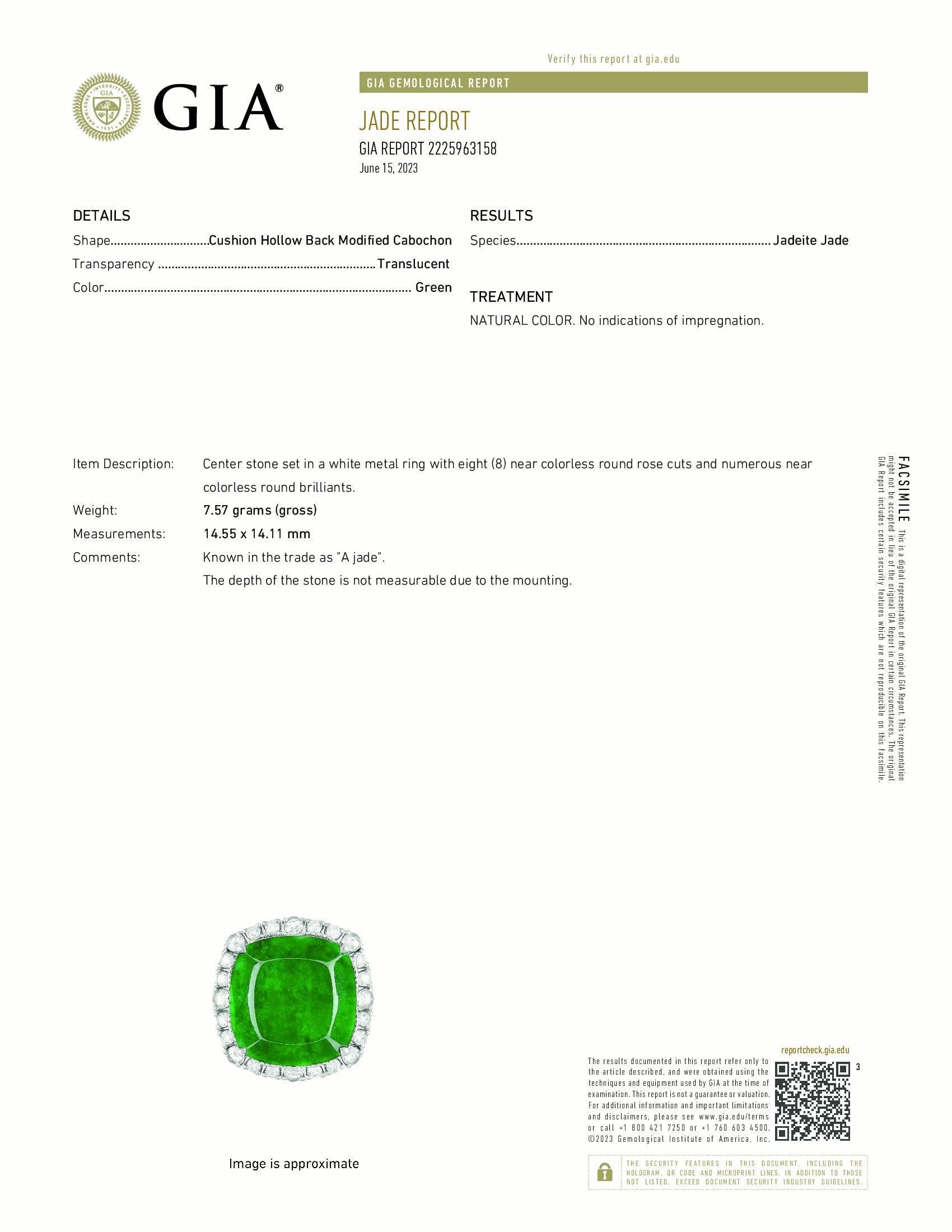 Item #8097

GIA Certified 
18K Imperial Green Jadeite Jade Ring with Diamonds
Center stone set in a white metal ring with eight (8) near colorless round rose cuts and numerous near colorless round brilliants. 

Colored Precious Stone: Jadeite Jade (