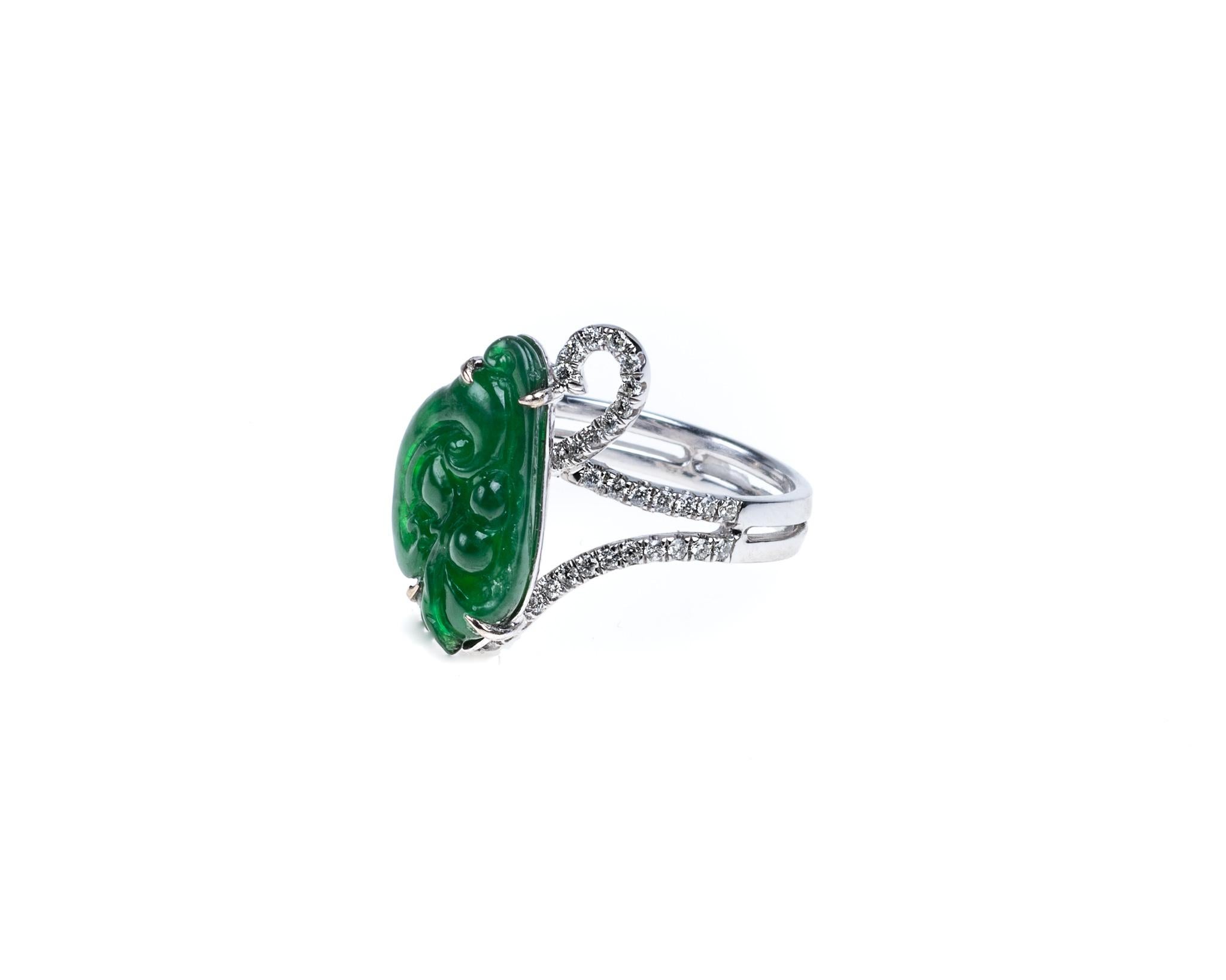 This is all natural, untreated imperial green jadeite jade carved ruyi with round brilliant diamonds totaling 0.41 carats, set in 18K white gold diamond ring.  

it measures 0.38 inches (9.7mm) x 0.70 inches (17.8mm) with thickness of 0.24 inches