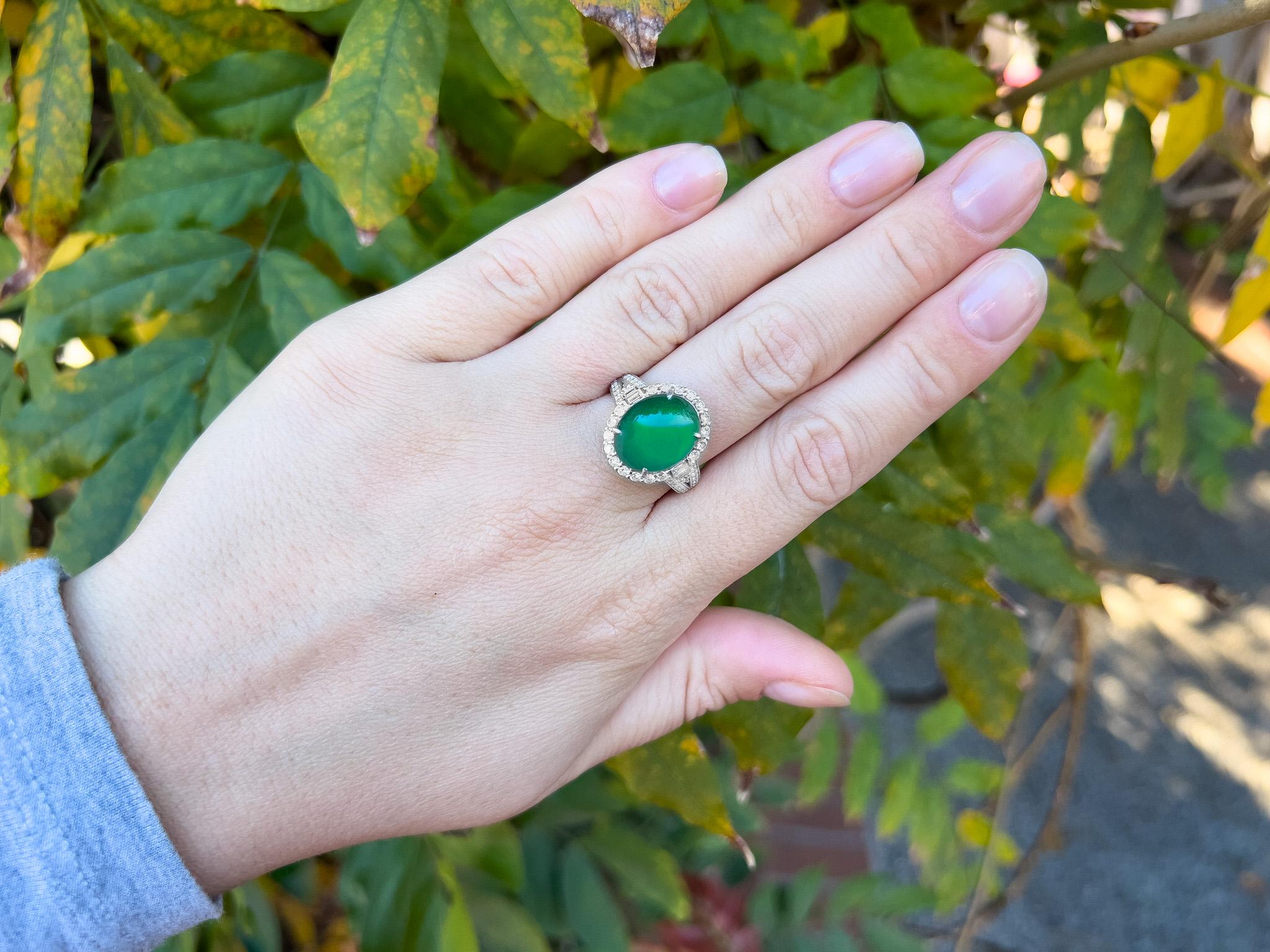 Imperial Jade
(Cut: Cabochon, Color: Green, Origin: Natural)
Diamond = 1.10 Carats
(Cut: Mixed, Color: D, Clarity: VS)
Metal = 18K White Gold
Ring Size = 7.75