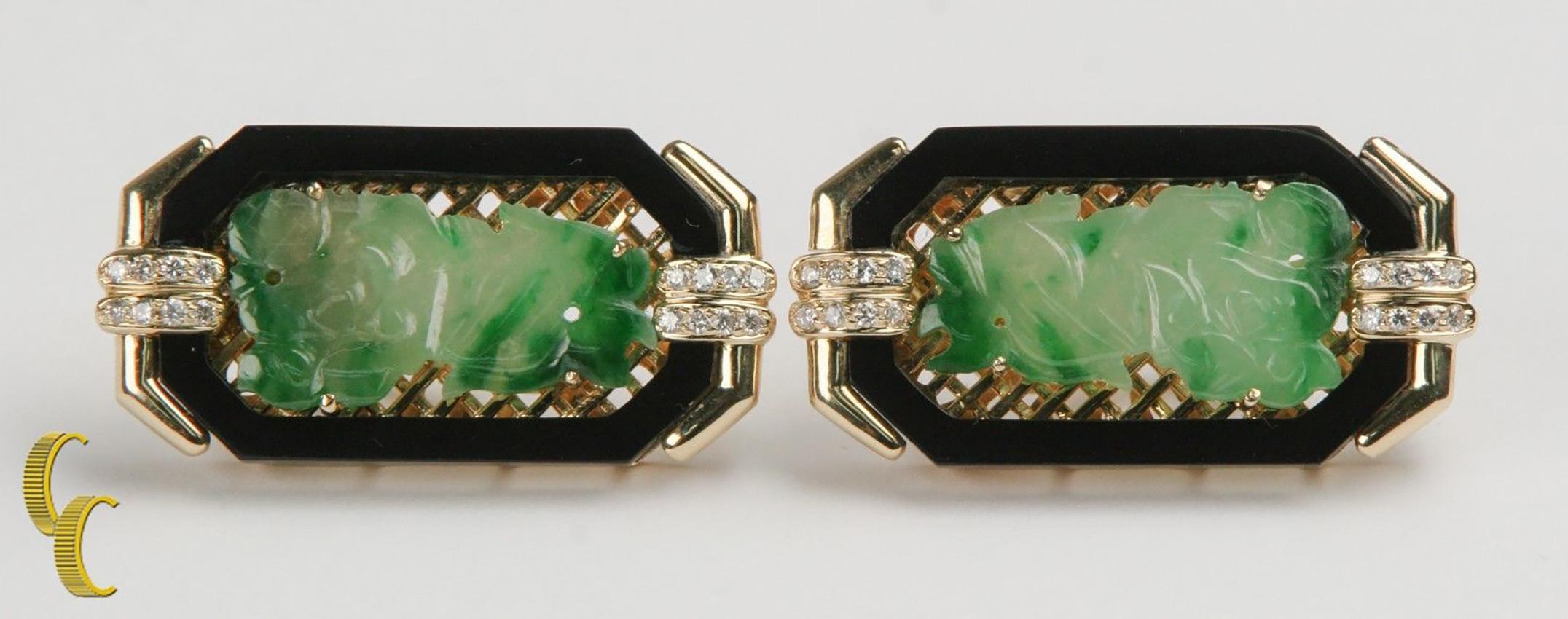 Gorgeous 18k Yellow Gold Huggie Earrings
Feature Prong-Set Carved Imperial Jade Stones Over Cross-Hatched 18k Gold Background Set over Gallery
Framed within Carved Onyx Rectangle
Includes 16 Round Brilliant Diamond Accents
Total Mass = 26.5