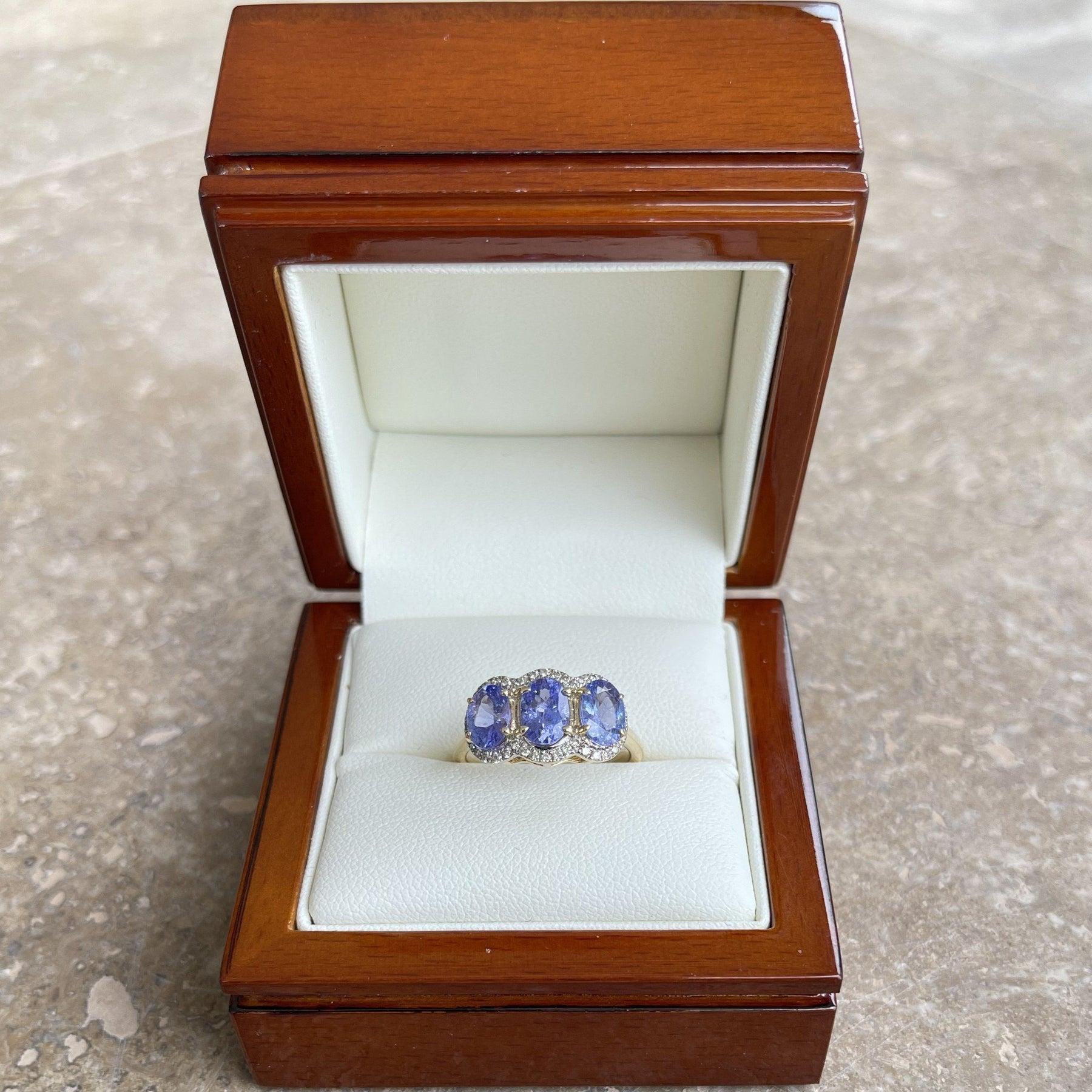 For Sale:  14ct Yellow Gold Tanzanite and Diamond Trilogy Ring 8