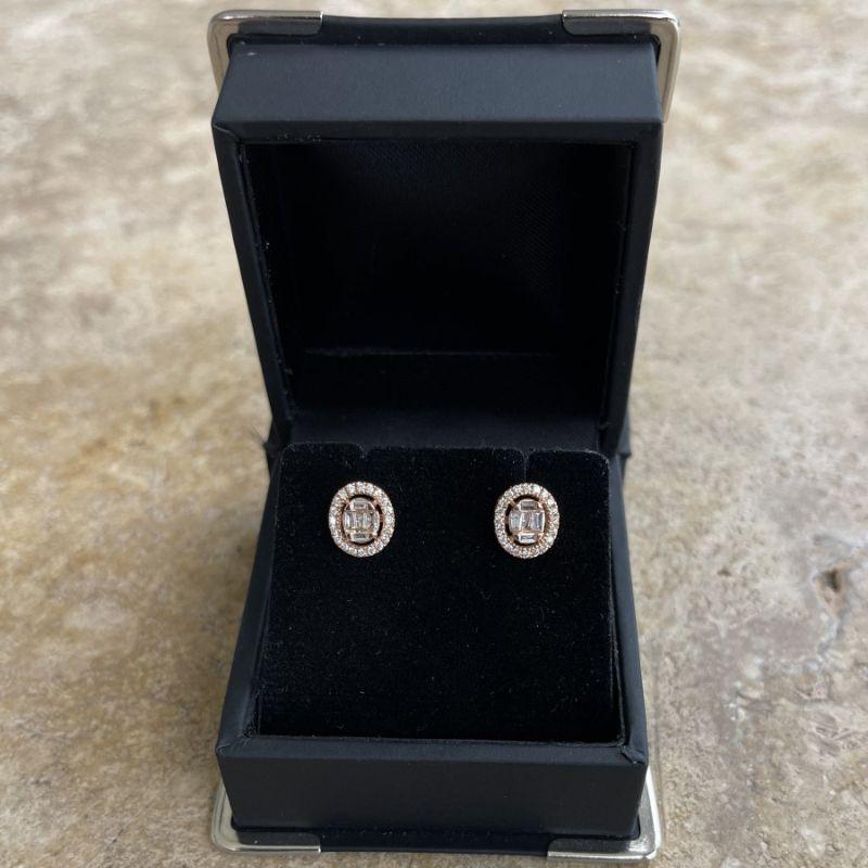 Diamonds, crafted with eighteen karat rose gold, featuring channel set tapered diamond baguettes and round brilliant cut diamonds, complemented by a stunning polished finish design.  

Round Diamond Weight: 0.15ct
Baguette Diamond Weight: