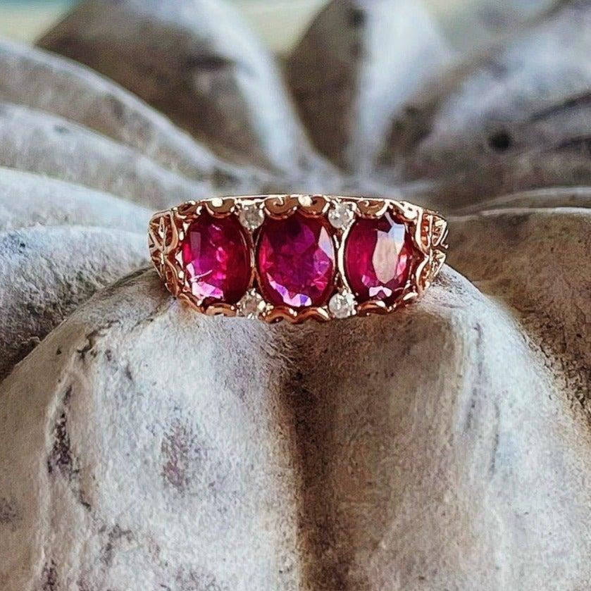 For Sale:  18ct Rose Gold Ruby and Diamond Trilogy Ring 8