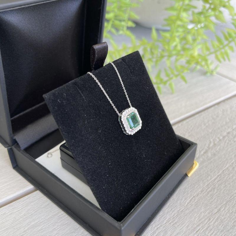 Emerald Cut 18ct White Gold Emerald and Diamond Pendant and Necklace For Sale
