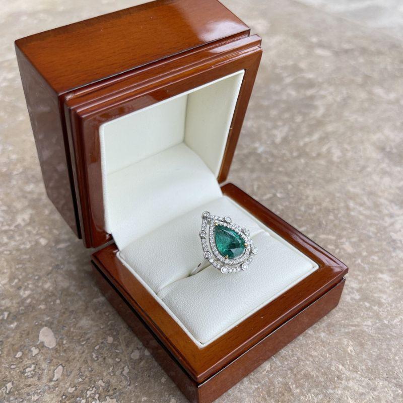 For Sale:  18ct White Gold Pear Emerald and Diamond Ring 9