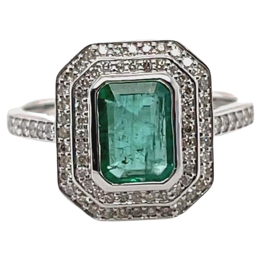 For Sale:  18ct White Gold Ring with 1.39ct Emerald and Diamond Ring 6