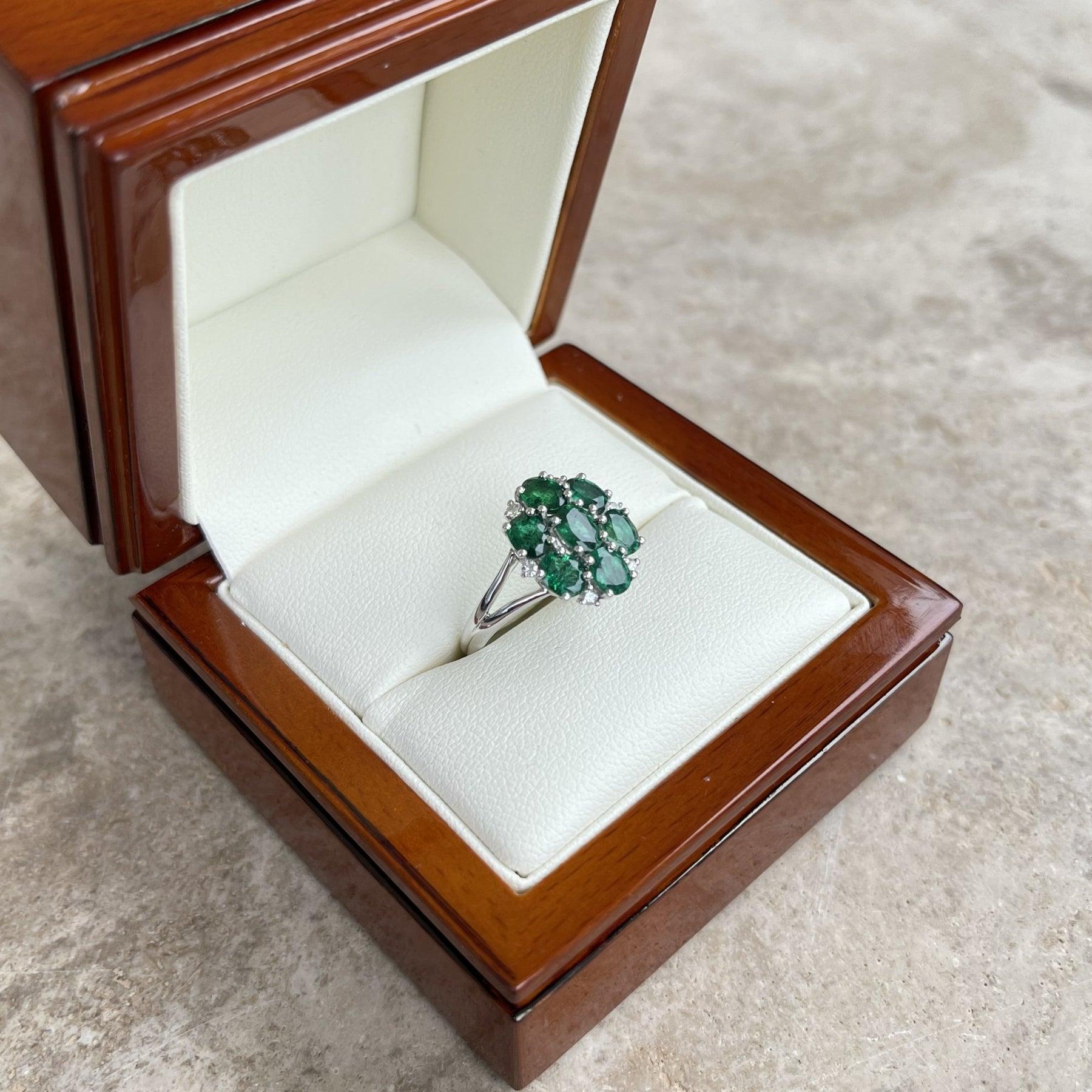 For Sale:  18ct White Gold Seven Stone Emerald and Diamond Ring 8