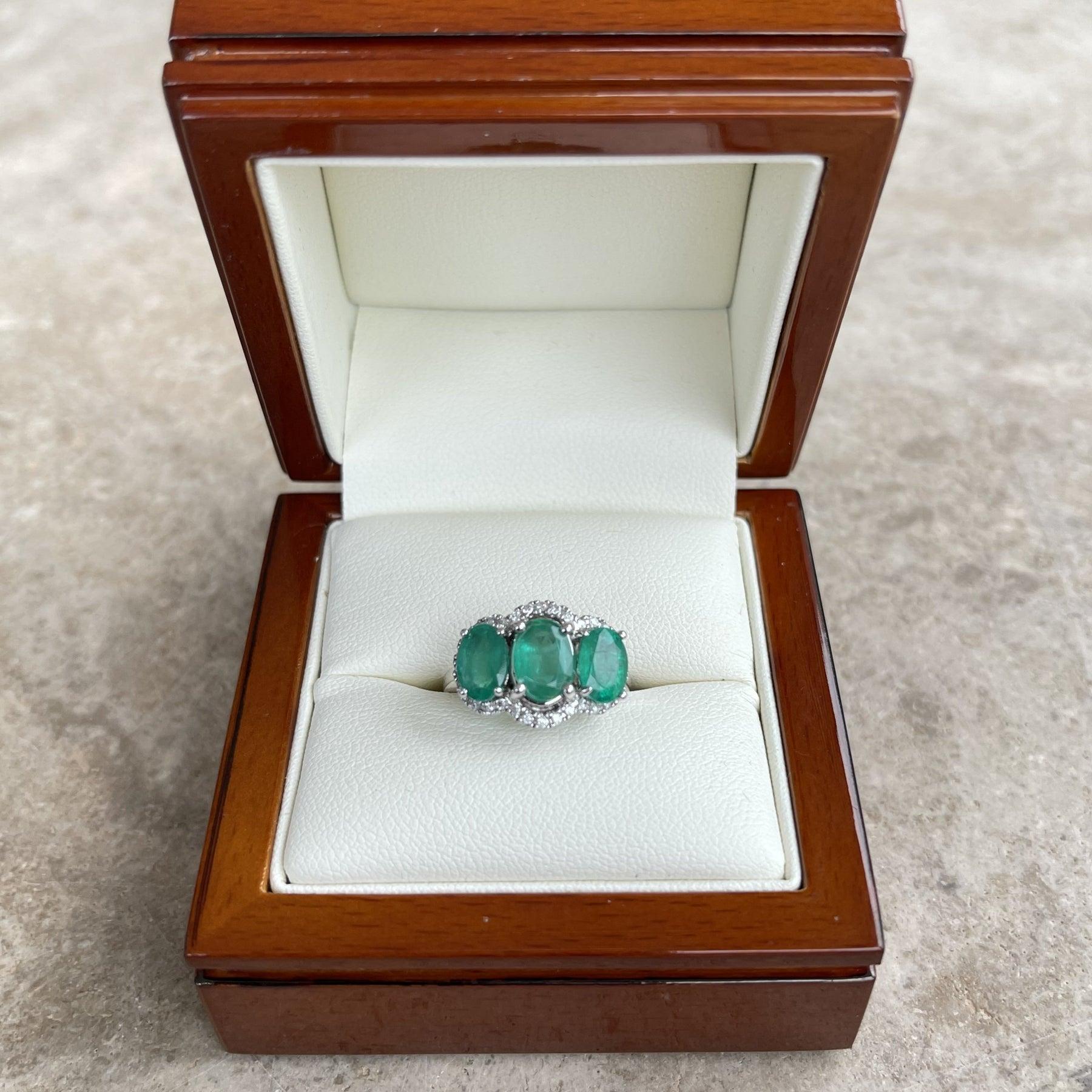 For Sale:  18ct White Gold Trilogy Emerald and Diamond Ring 7