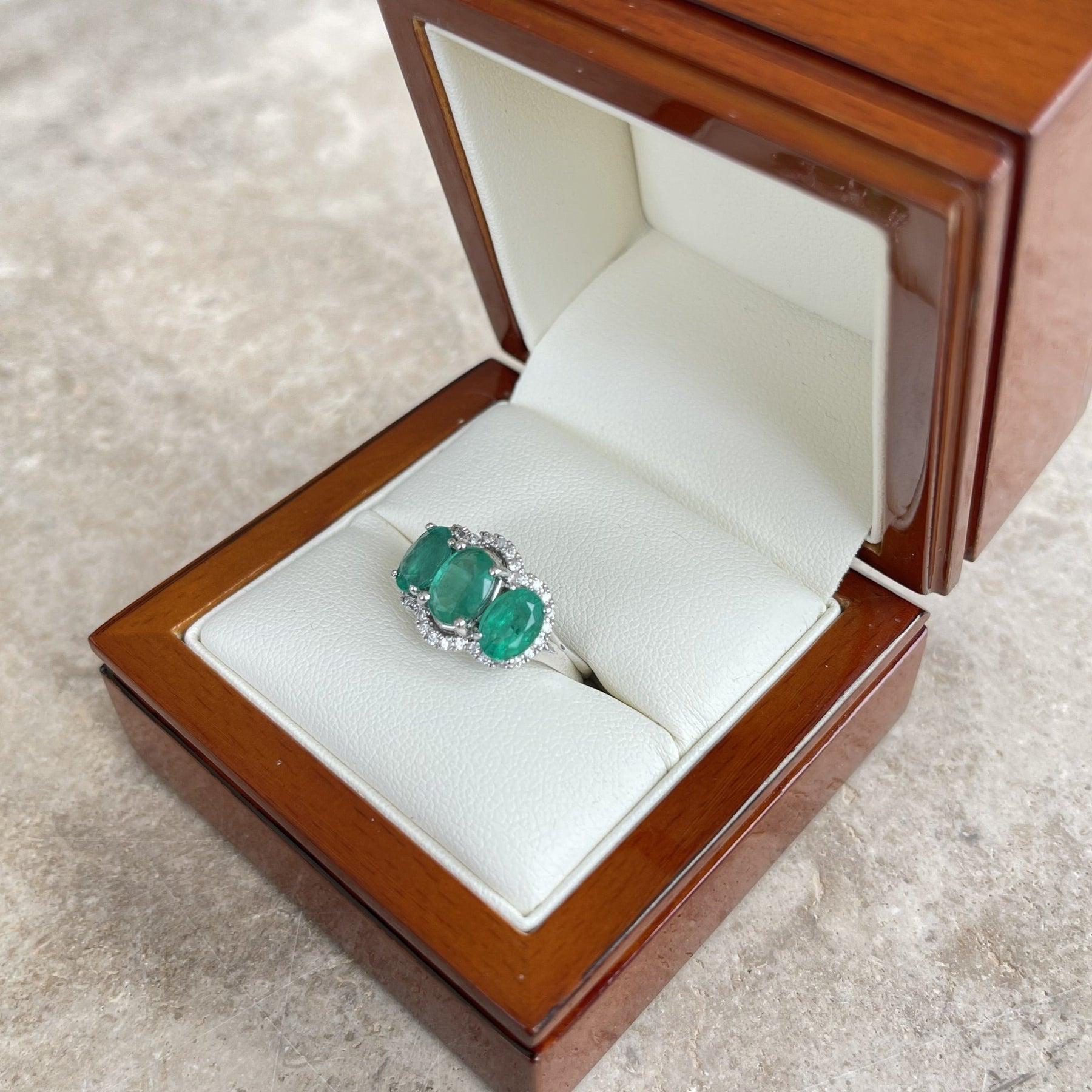 For Sale:  18ct White Gold Trilogy Emerald and Diamond Ring 8