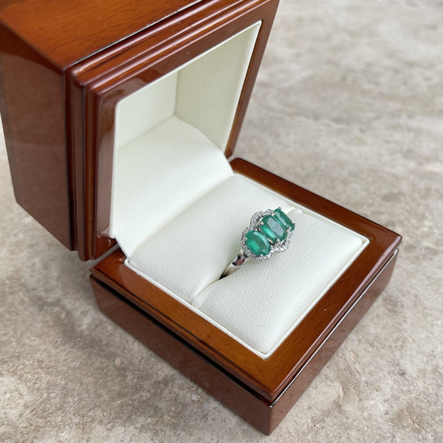 For Sale:  18ct White Gold Trilogy Emerald and Diamond Ring 9