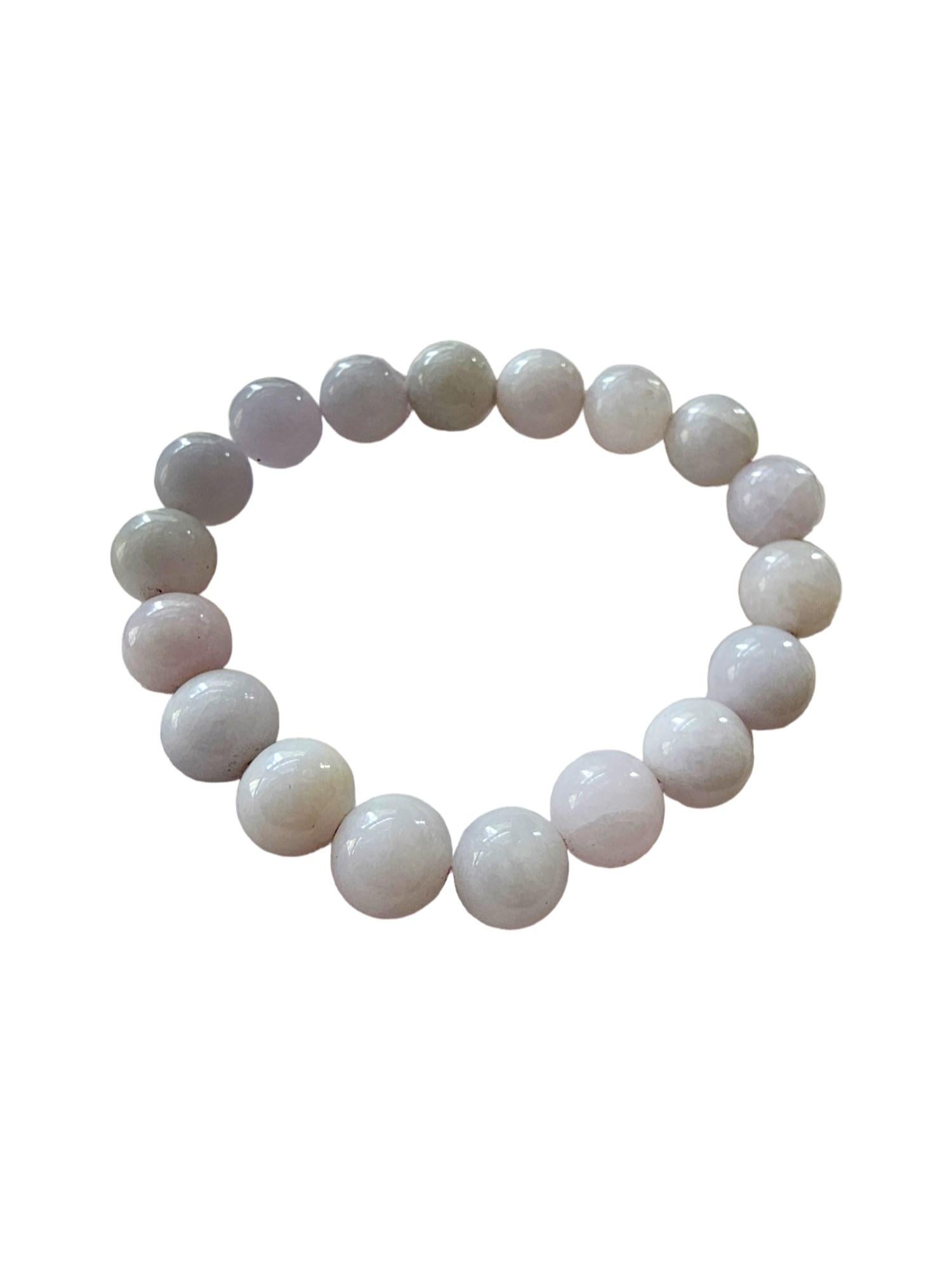 Bracelet de perles A-Jade birman impérial lavande (10 mm chacune x 18 perles) 06003 

10mm chacune, 18 perles de jadéite lavande parfaitement calibrées. Ce bracelet en jadéite A de Birmanie est l'une des teintes naturelles les plus rares de la