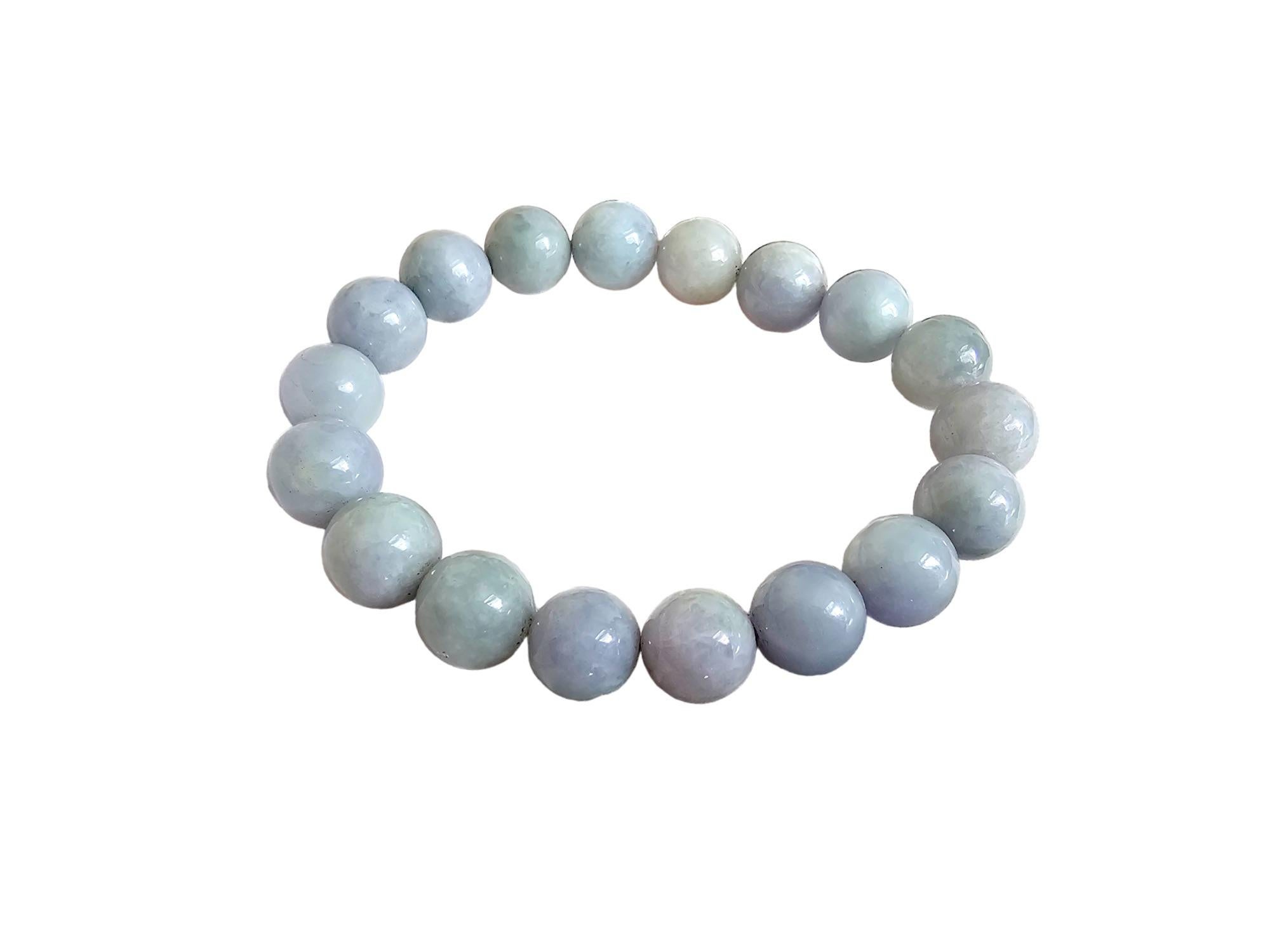 Imperial Purple and Green Lavender Burmese A-Jade Jadeite Beaded Bracelet (10-11mm Each x 18 beads) 06006

10-11mm each, 18 perfectly calibrated Green and Lavender Jadeite Beads. Some of the rarest naturally occurring hues of Jadeite and superior