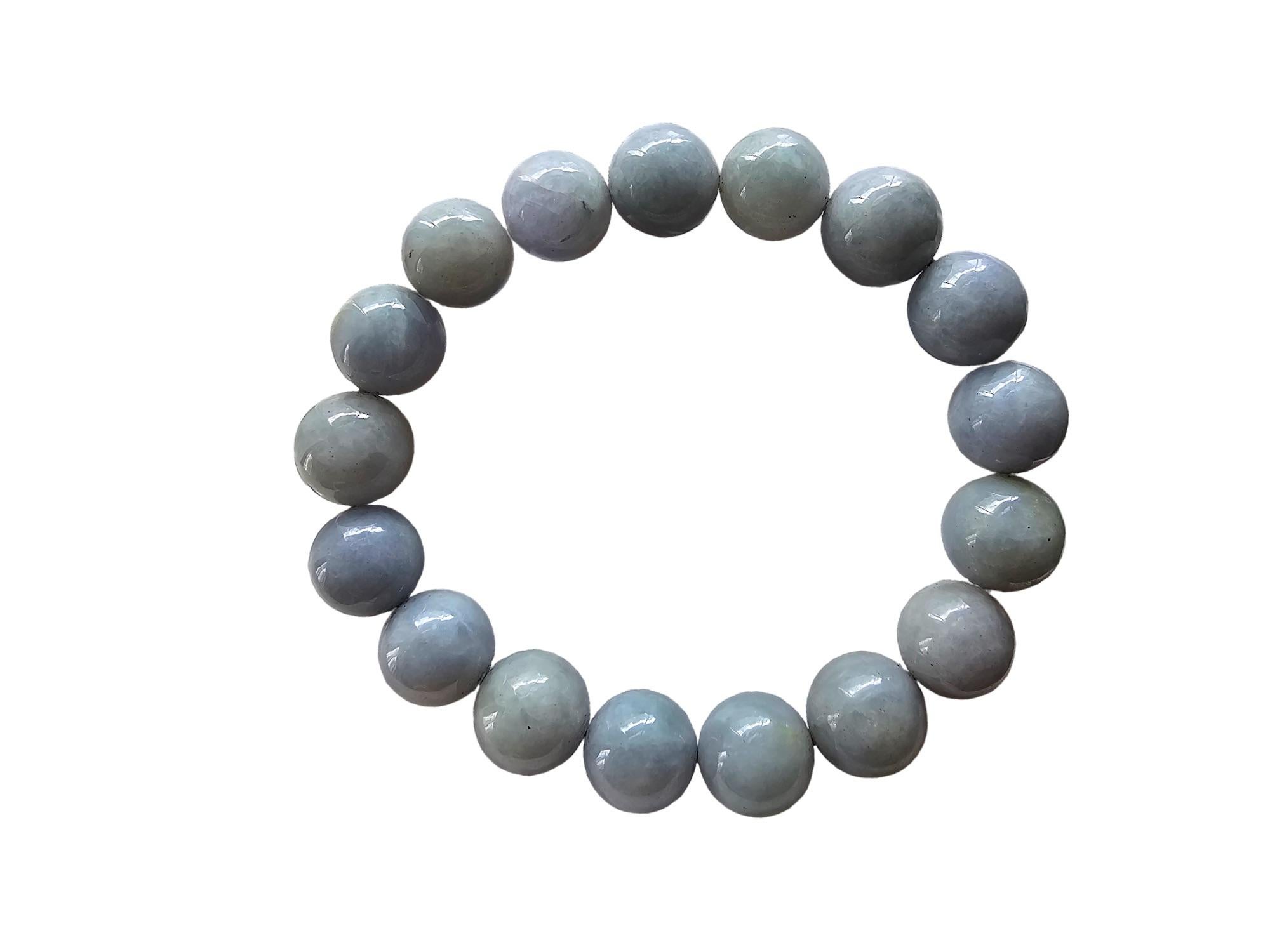 Imperial Purple and Green Lavender Burmese A-Jade Jadeite Beaded Bracelet (11-12mm Each x 17 beads) 06007

11-12 mm each, 17 perfectly calibrated Green and Lavender Jadeite Beads. Some of the rarest naturally occurring hues of Jadeite and superior