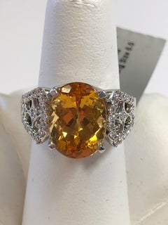Imperial Orange Topaz Oval and White Diamond Ring in Platinum
