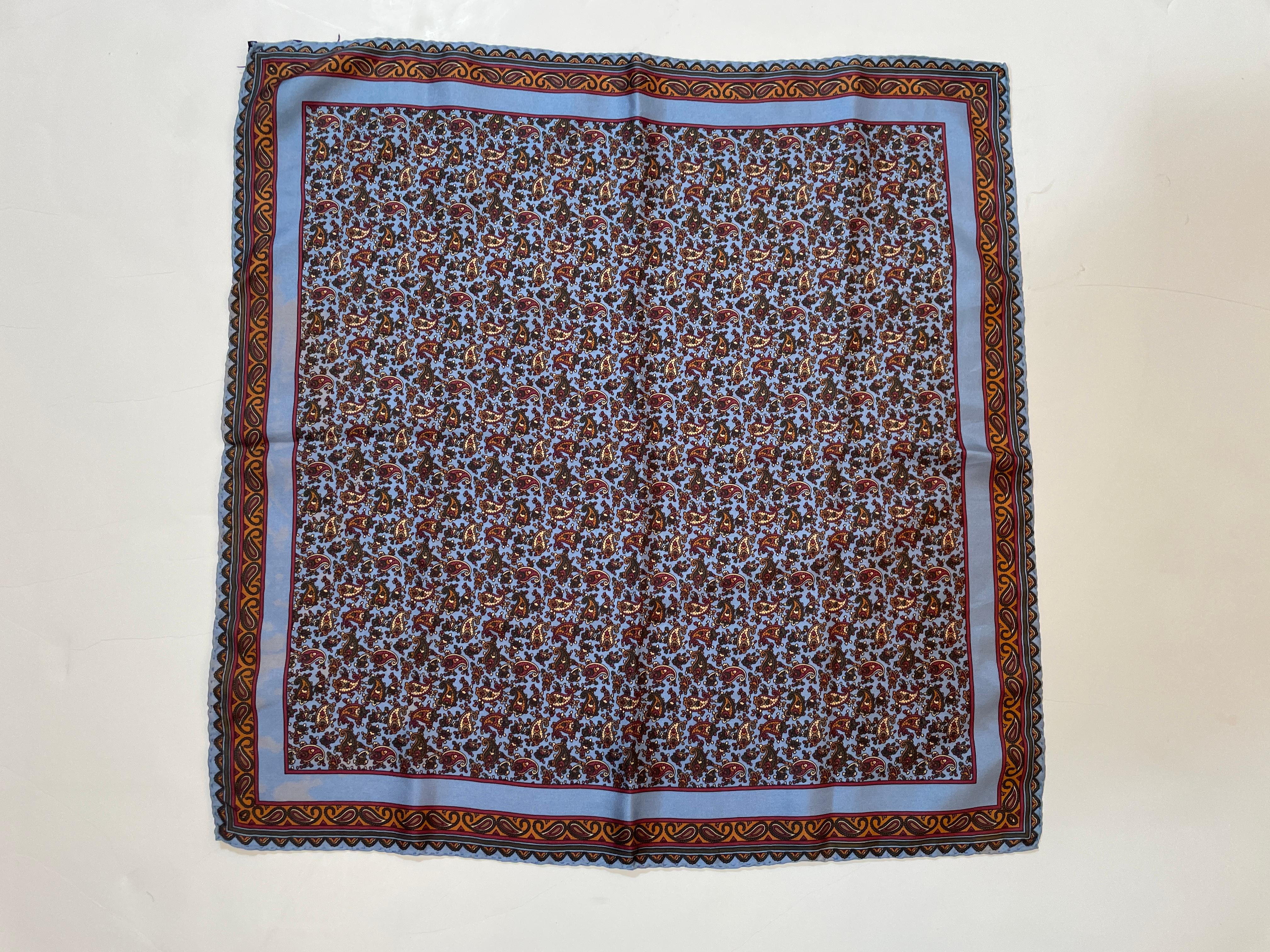 IMPERIAL Pocket Square 100% Silk Handkerchief.
Made in Italy and rolled edge. 
Beautiful colors vintage blue silk pocket square scarf in rust, orange and gold paisley design motif print
Hand rolled edges.
Hallmark Brand Signature: IMPERIAL.
Made in