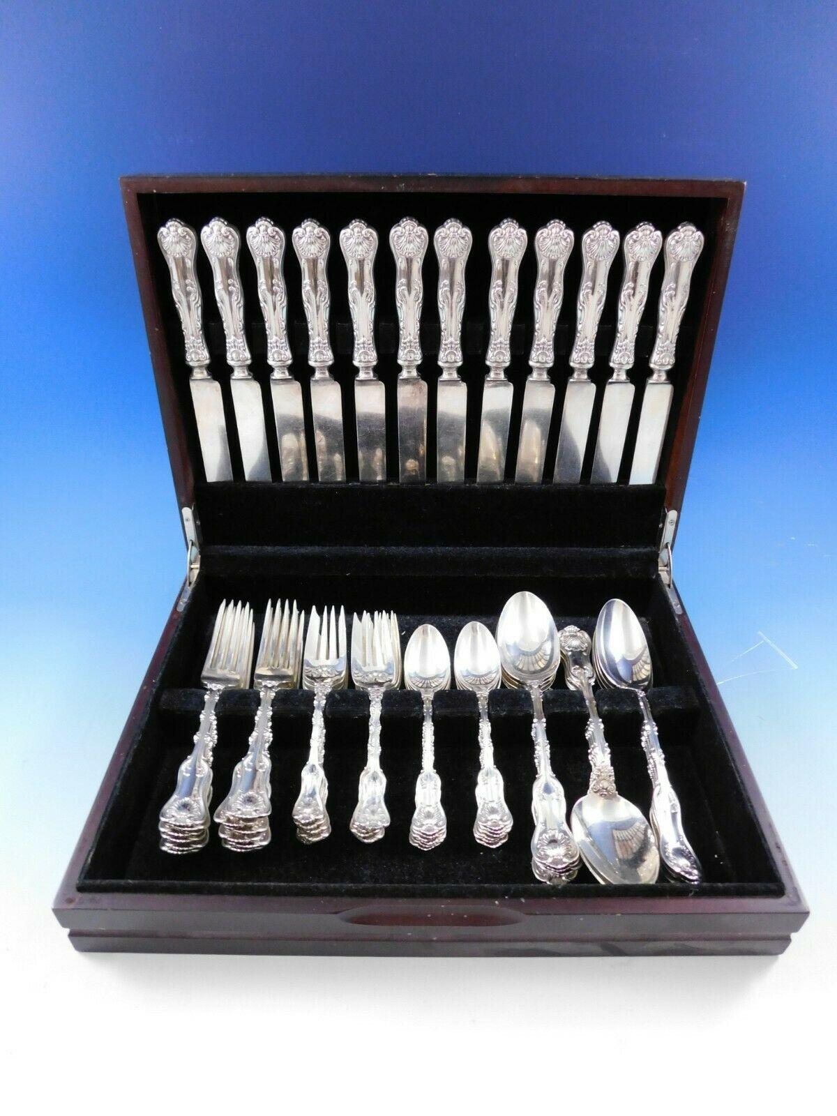 Dinner Size Imperial Queen by Whiting sterling silver flatware set with classic shell motif and fiddle shape, 60 pieces. This set includes:

12 dinner size knives with blunt plated blades, 9 1/2