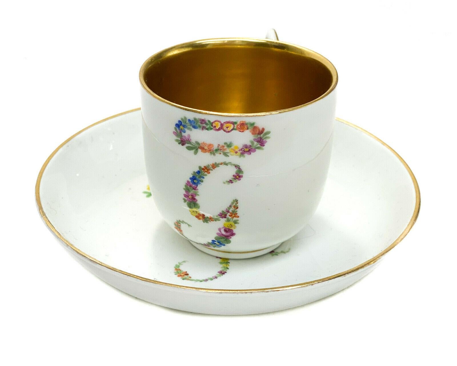 Imperial Royal Vienna Factory Austrian hand painted porcelain cup & saucer, 1787

Hand painted flowers in a monogram G and A with a halo. Imperial Royal Vienna beehive mark to the underside.

Additional information:
Time Period Manufactured:
