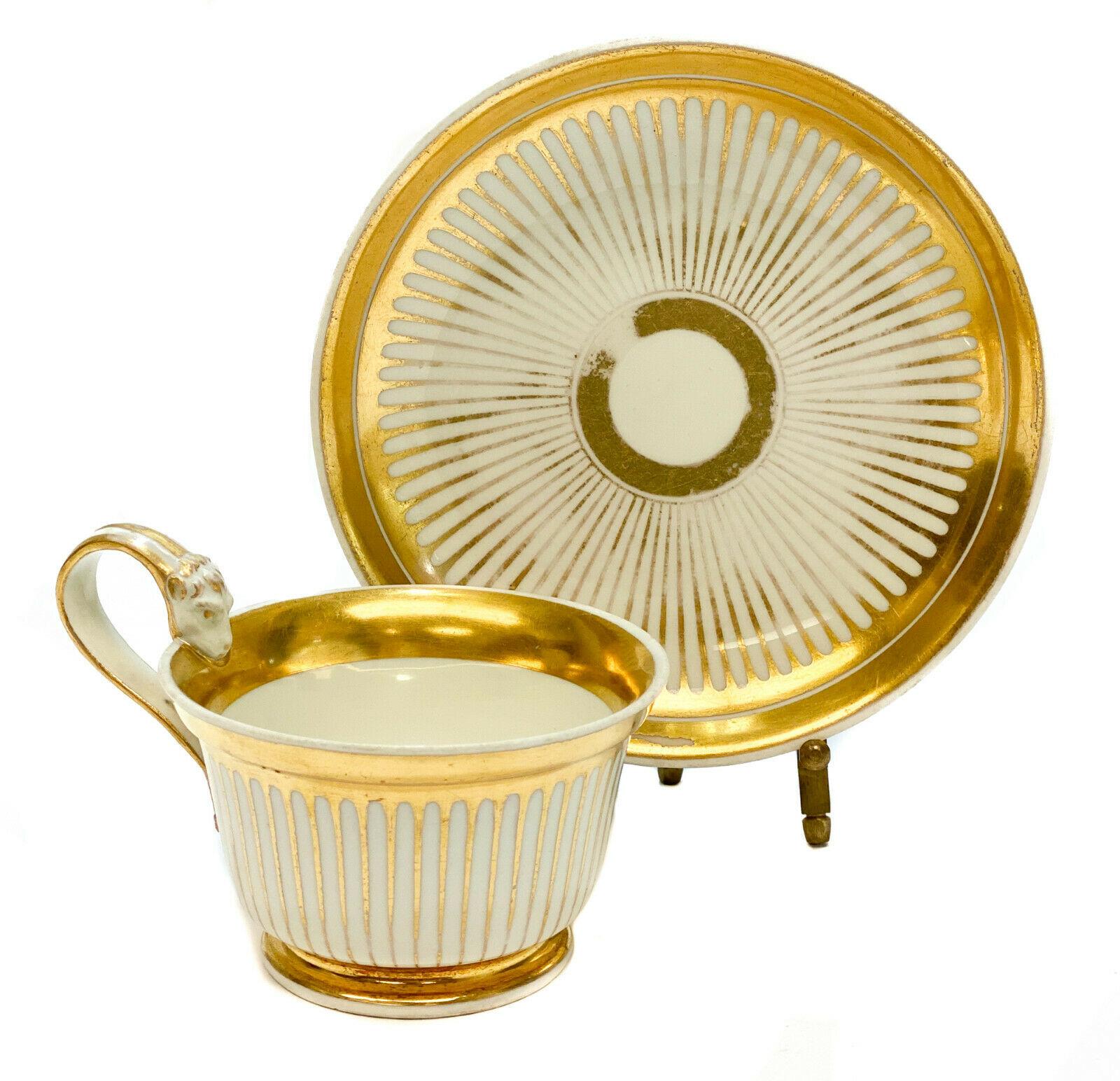 Imperial Royal Vienna porcelain and gilt striped cup & saucer, 1821

Gilt ribbed stripes around the exterior of the cup and center of the saucer with thick gilt bands to the rims. Royal Vienna beehive mark to the underside.

Additional