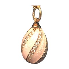 Imperial Russian 14 Karat Guilloche Enamel Egg Pendent Set with Diamonds