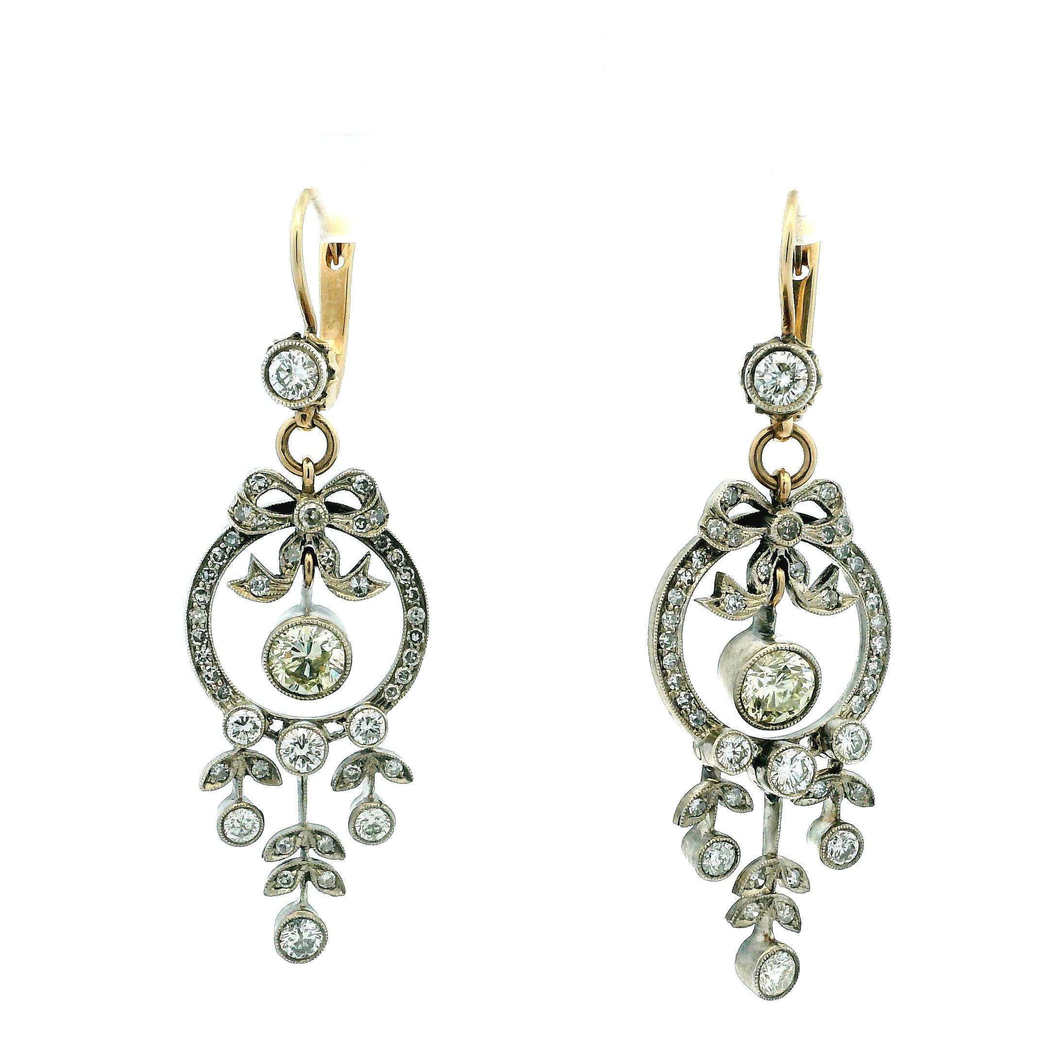 Stamped 56 zolotnik, indicating Imperial Russian assay, c. 1895–1910.
A finely crafted pair of Imperial Russian Belle Époque diamond drop earrings, circa 1895–1910, executed in 56 zolotnik gold with silver-topped settings, and set throughout with