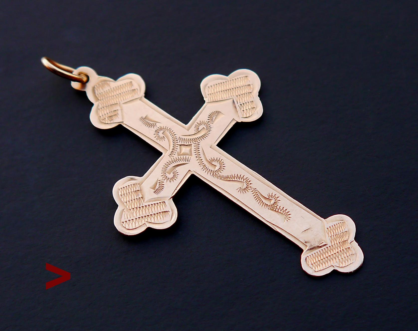 Ukrainian / Russian Orthodox Cross pendant in solid 56 / 14K Rose Gold. Delicate hand-engraved ornament.
Hallmarked with old Russian Gold standard 56 zolotniks (14K) used between 1908 -1917. Assay of Kiev city.

Maker's initials in Cyrillic 