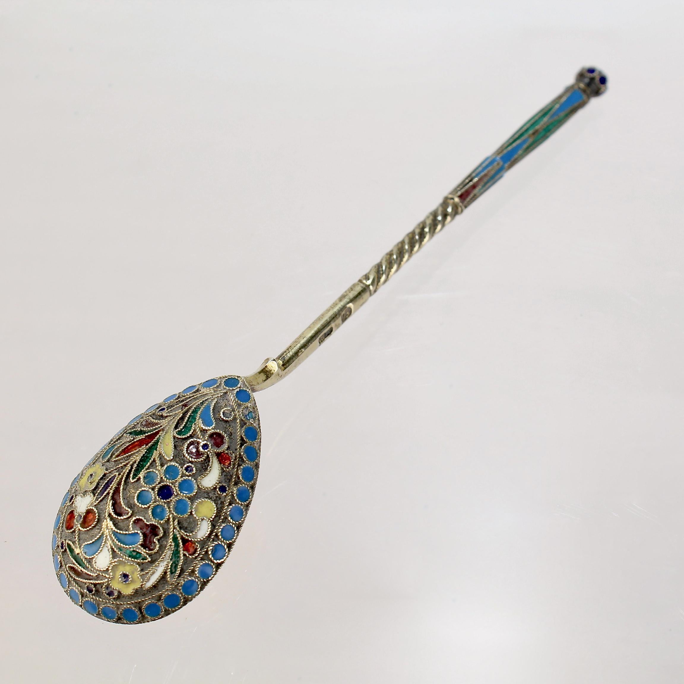 A very fine antique Russian tea or kvosh spoon.

By Eros Samoschin.

With polychrome cloisonné enamel decoration to both the front and back.

Simply a wonderful piece of Russian silver!

Date:
Late 19th or Early 20th Century

Overall Condition:
It