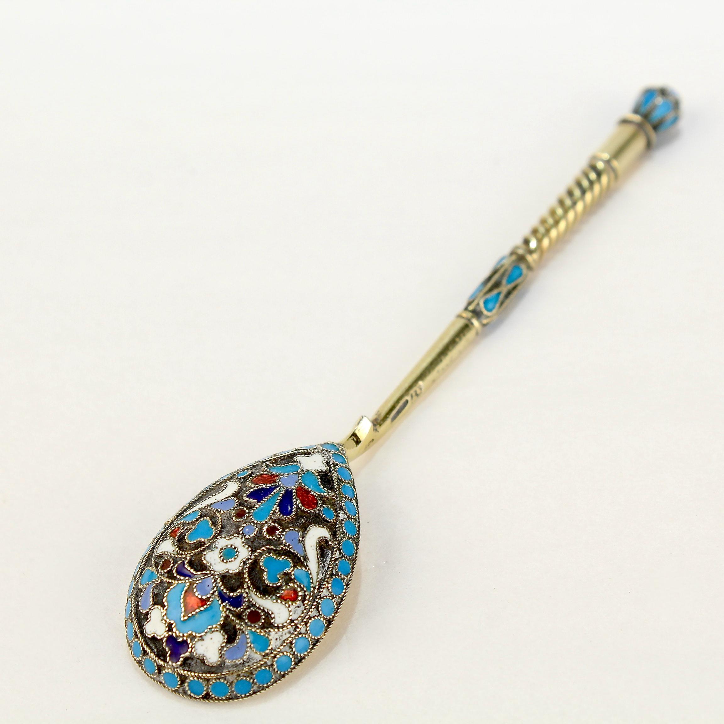 A very fine antique Russian tea or kvosh spoon.

Additional Details:
Possibly by Alexsander Krivovichev. (The maker's mark is partly obliterated).

With polychrome cloisonné enamel decoration to both the front and reverse.

Simply a wonderful piece
