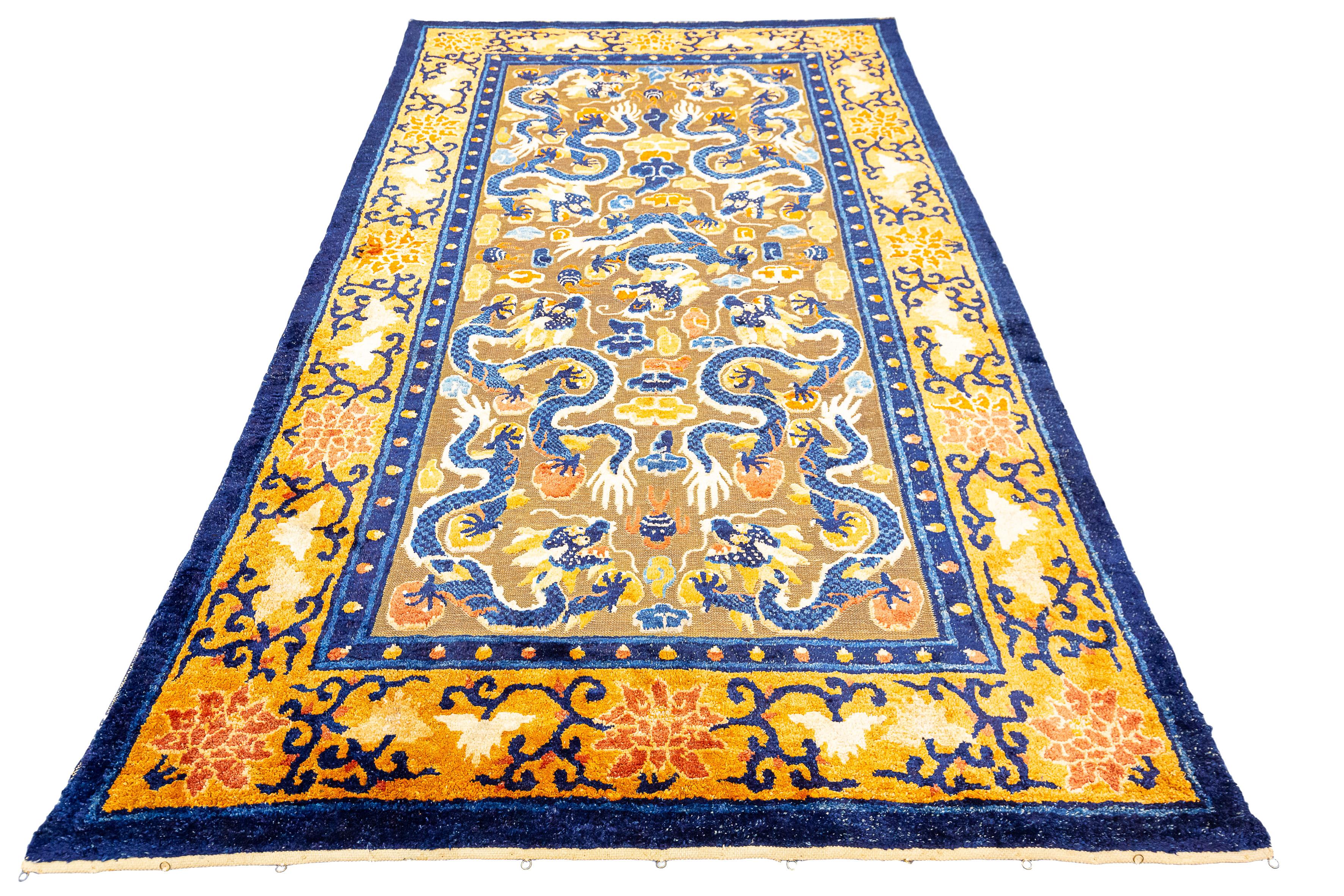 Prepare to be transported to a world of imperial grandeur and timeless elegance with our Imperial Silk & Metal Thread Chinese Rug, a masterpiece that showcases the pinnacle of Chinese artistry. This rug features a stunning design of nine mighty