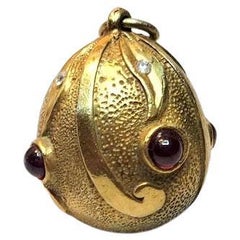 Antique Imperial Silver Gilt Egg Pendant with Garnets and Diamonds