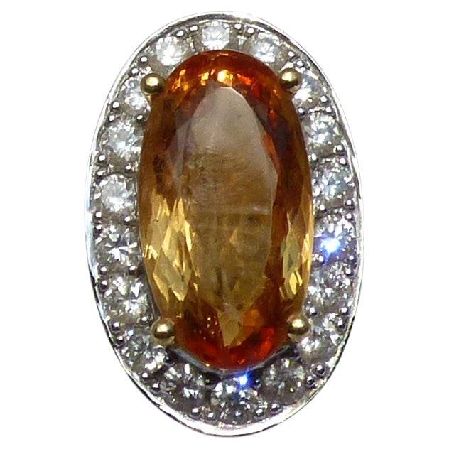 Imperial Topaz 10.3ct and Diamond Cluster Ring
