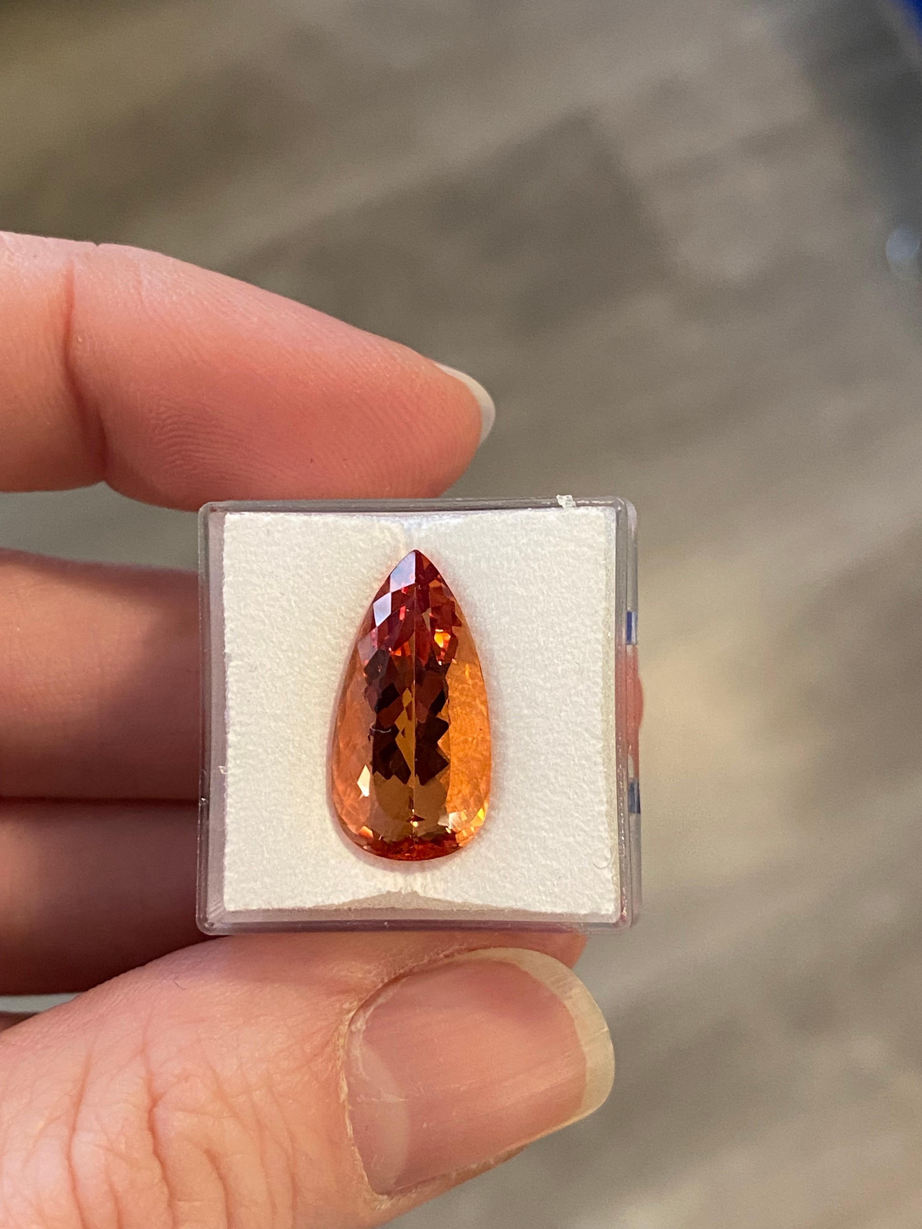 A pear shaped Imperial Topaz of 9.52 ct. This stone can made into a beautiful piece of jewellery by our talented artisans in Geneva. 