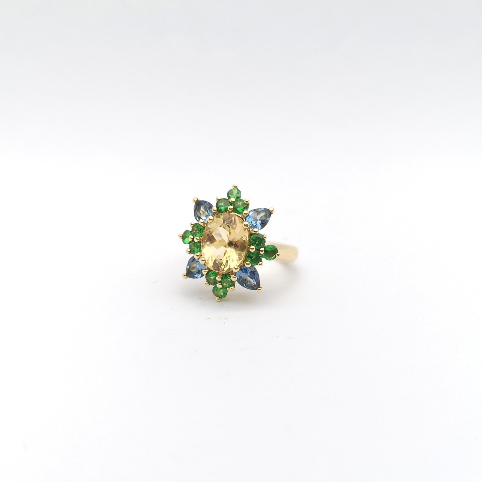 Imperial Topaz, Aquamarine and Tsavorite Ring set in 18K Gold Settings For Sale 4