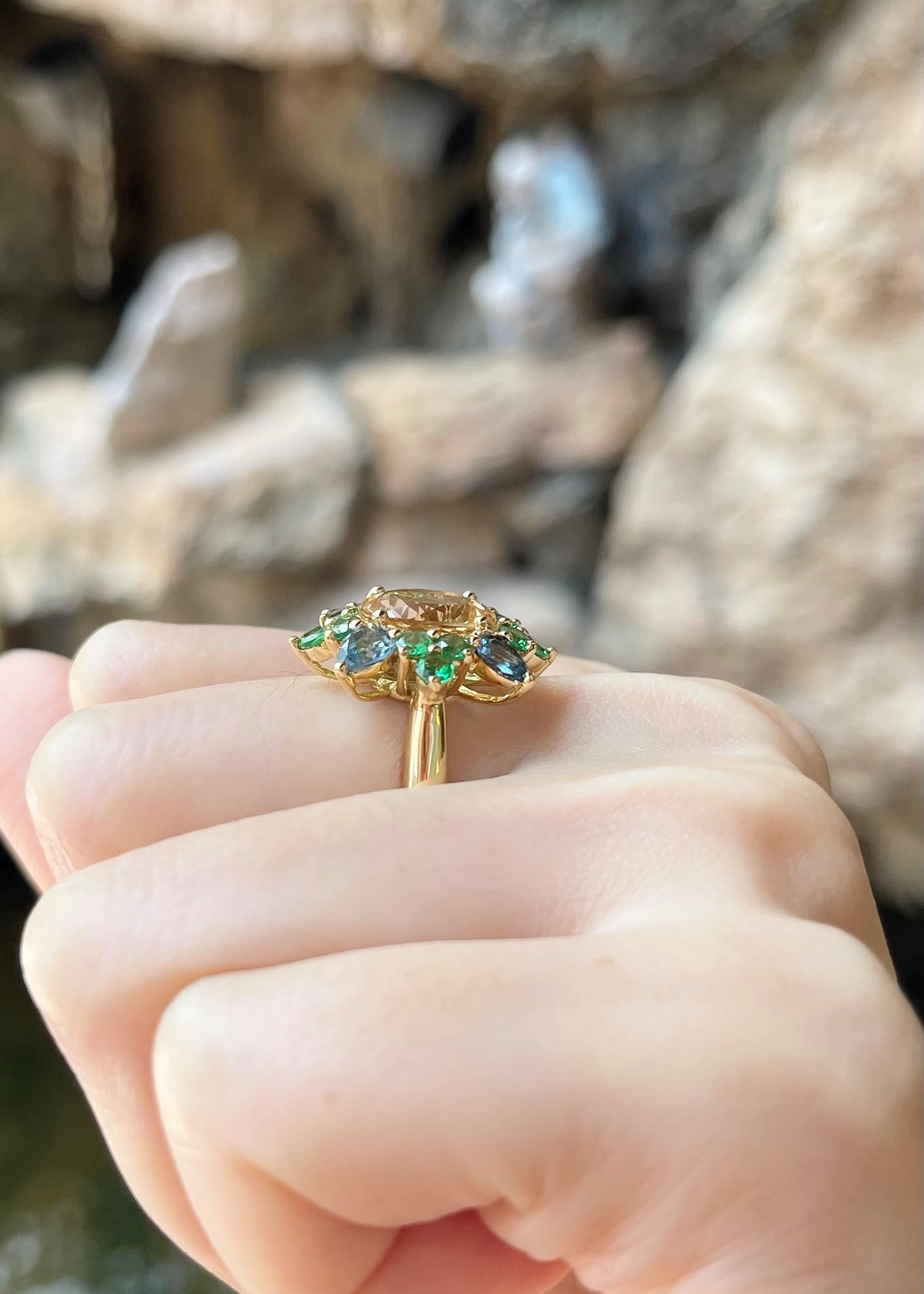 Mixed Cut Imperial Topaz, Aquamarine and Tsavorite Ring set in 18K Gold Settings For Sale
