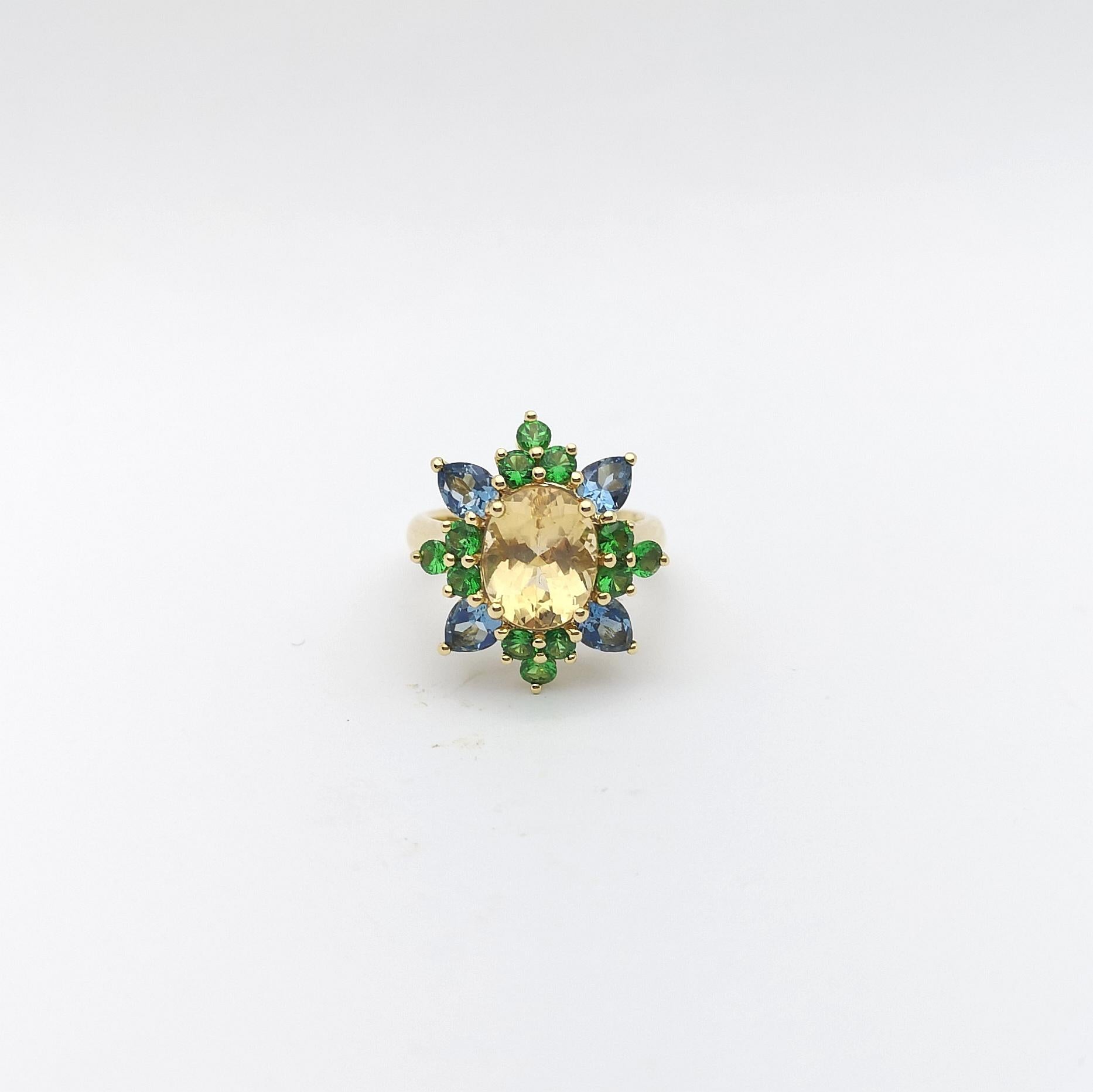 Imperial Topaz, Aquamarine and Tsavorite Ring set in 18K Gold Settings For Sale 3