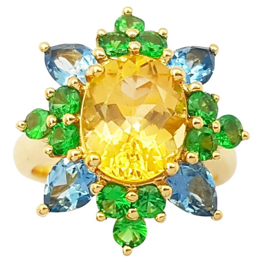 Imperial Topaz, Aquamarine and Tsavorite Ring set in 18K Gold Settings
