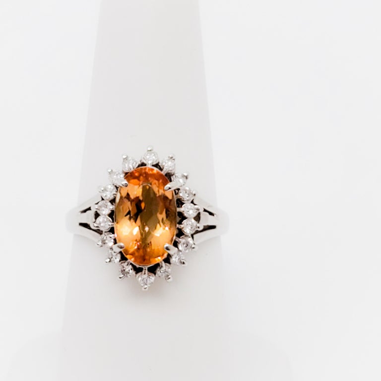 Imperial Topaz Oval and White Diamond Cluster Ring in Platinum For Sale