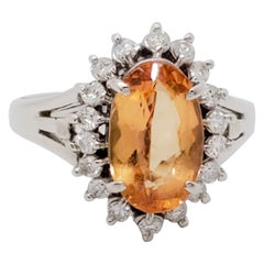 Imperial Topaz Oval and White Diamond Cluster Ring in Platinum