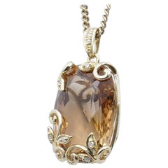 Imperial Topaz Pendant of 37 Carat in Yellow Gold