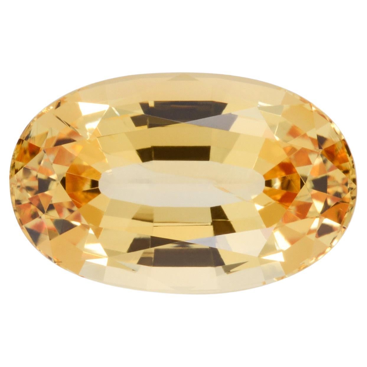 Topaze impériale ovale de 10,57 carats : Gemme rayonnante pour les créations de bijoux de luxe personnalisés