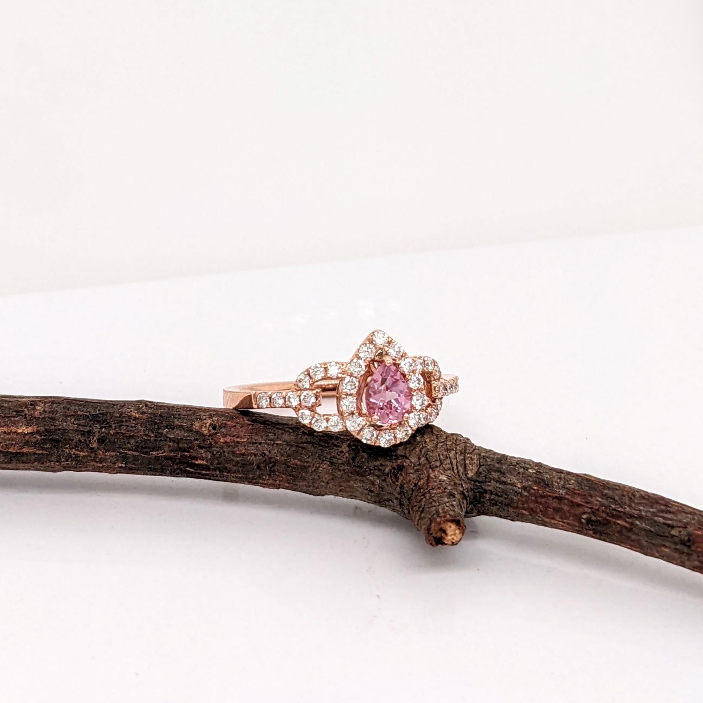 This beautiful ring features a 0.34 carat pear shape Imperial Topaz gemstone with natural earth mined diamonds set in solid 14K gold. This ring makes a lovely November birthstone gift for your loved ones! 

Specifications

Item Type: Ring
Center