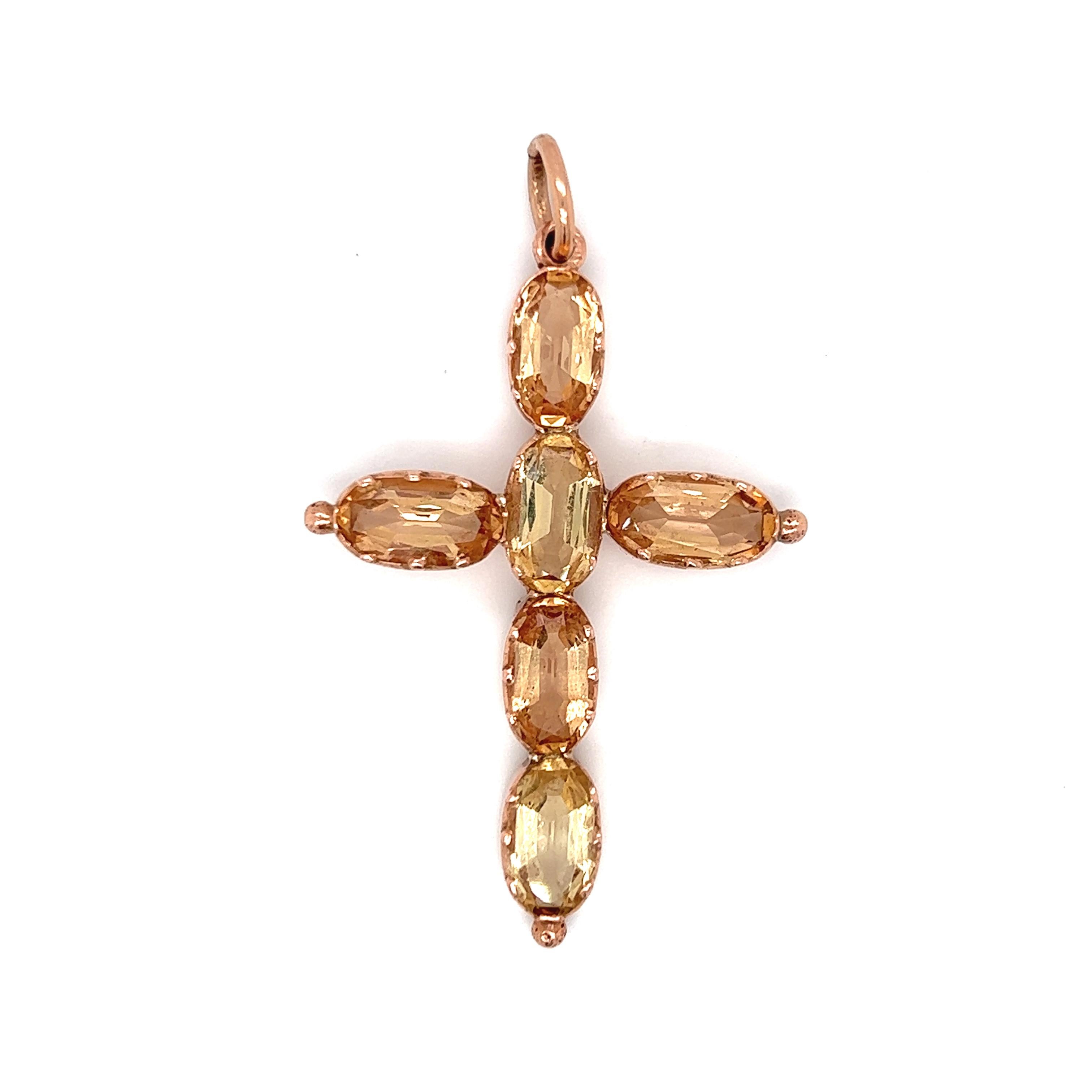 Immaculate and glistening imperial topaz faceted ovals are set in an uncomplicated rose gold cross shape. Beautiful, clean, and pure. Measures 2 1/2 x 1 1/4 inches.