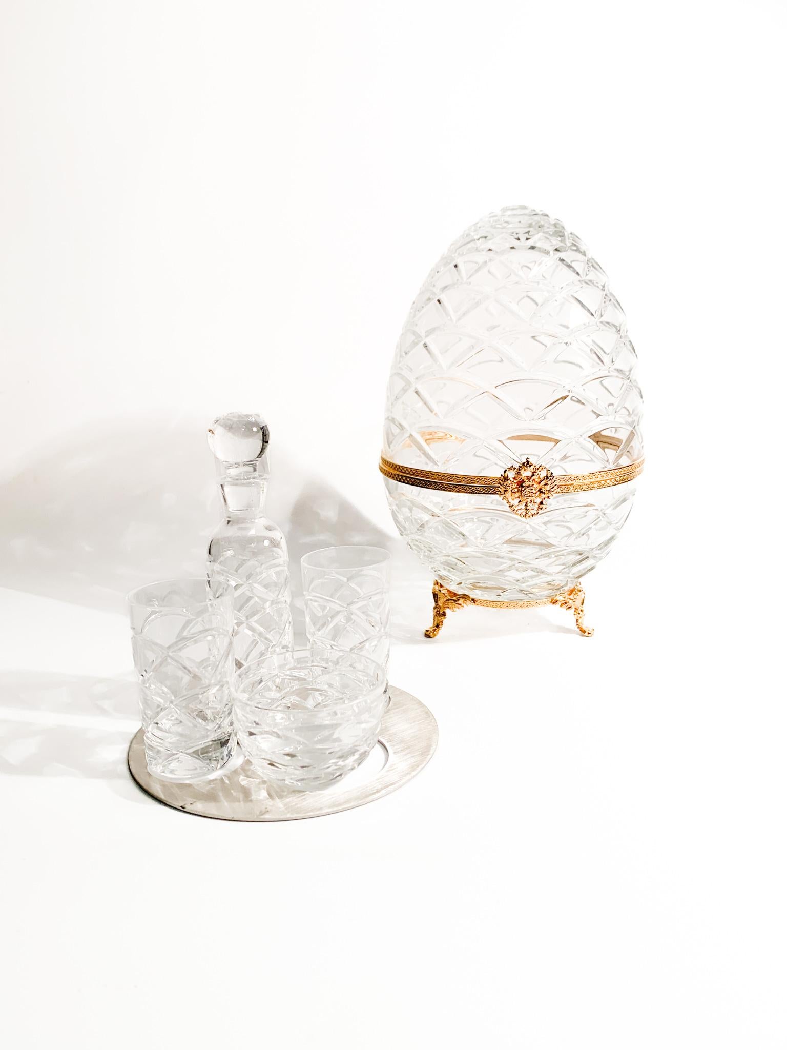 Imperial Vodka and Caviar Set in Fabergé Crystal. The set includes a new Faberge, two vodka glasses, a caviar bowl and a bottle. It includes a box.

Egg - Ø 15 cm h 25 cm 

Fabergé refers to the renowned House of Fabergé, a company of Russian