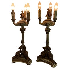 Antique Impero  style Lacquered and gilded wood candlesticks from the late 1800s